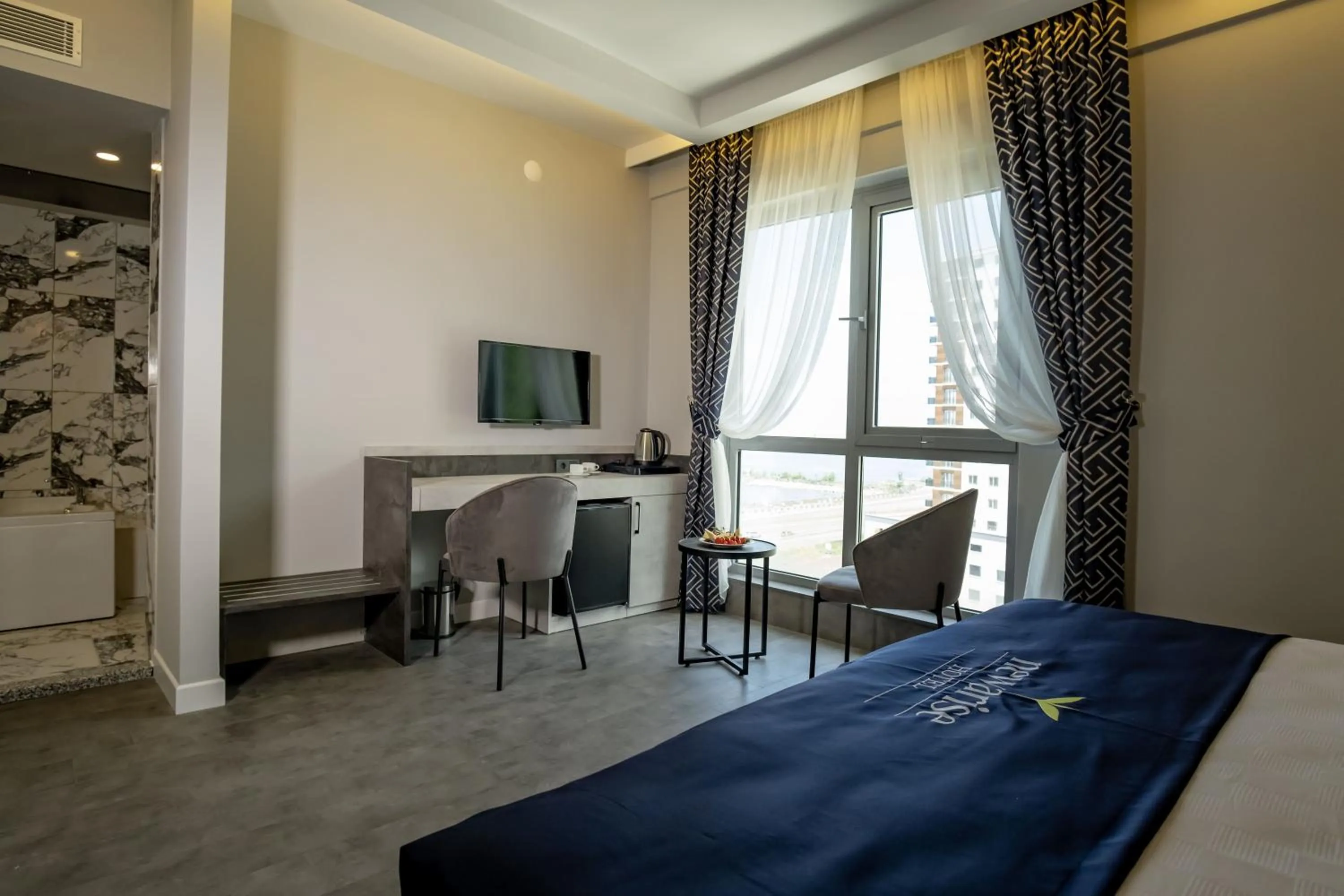 Bed in Newarise Hotel