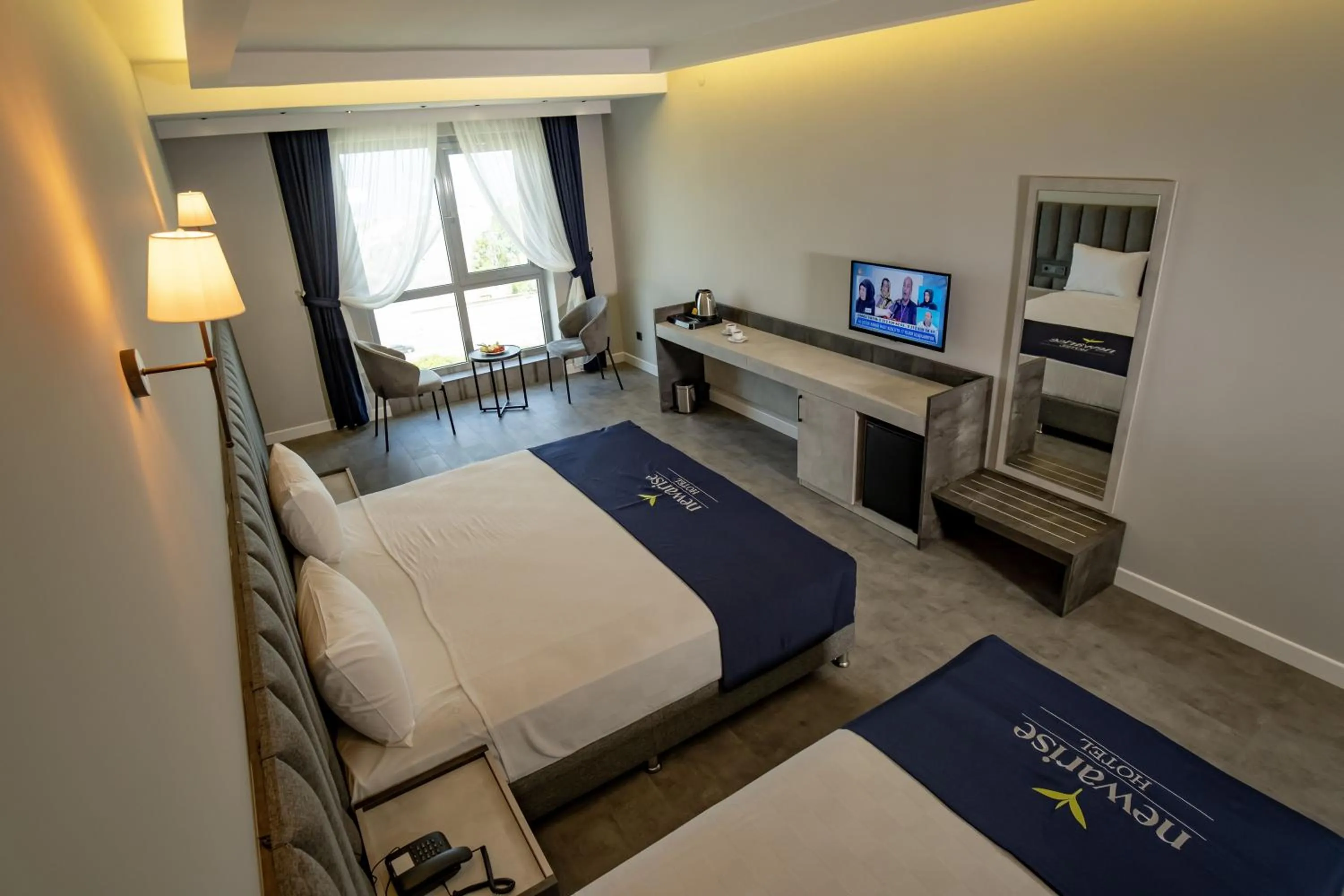 Bed in Newarise Hotel