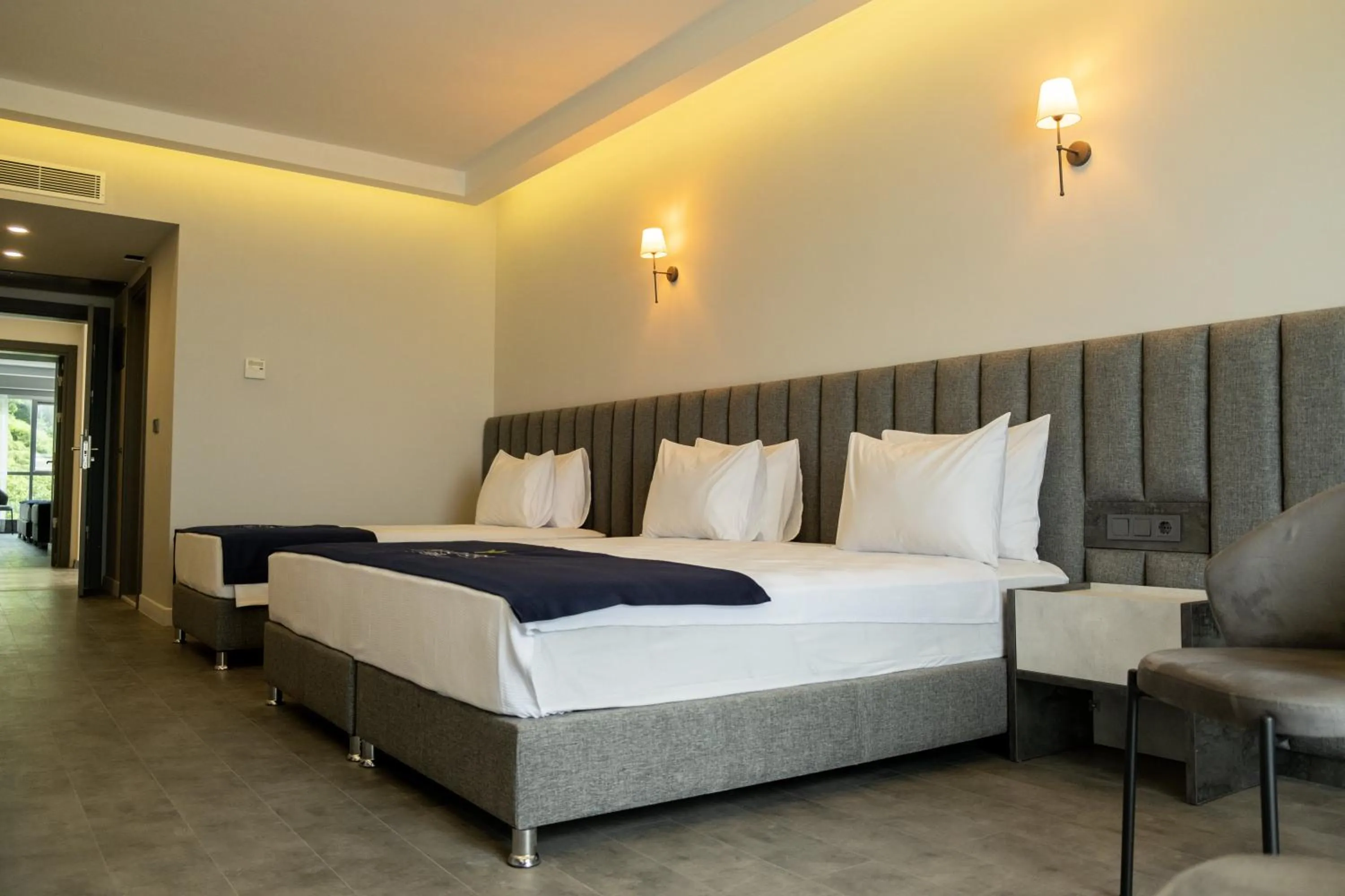 Bed in Newarise Hotel