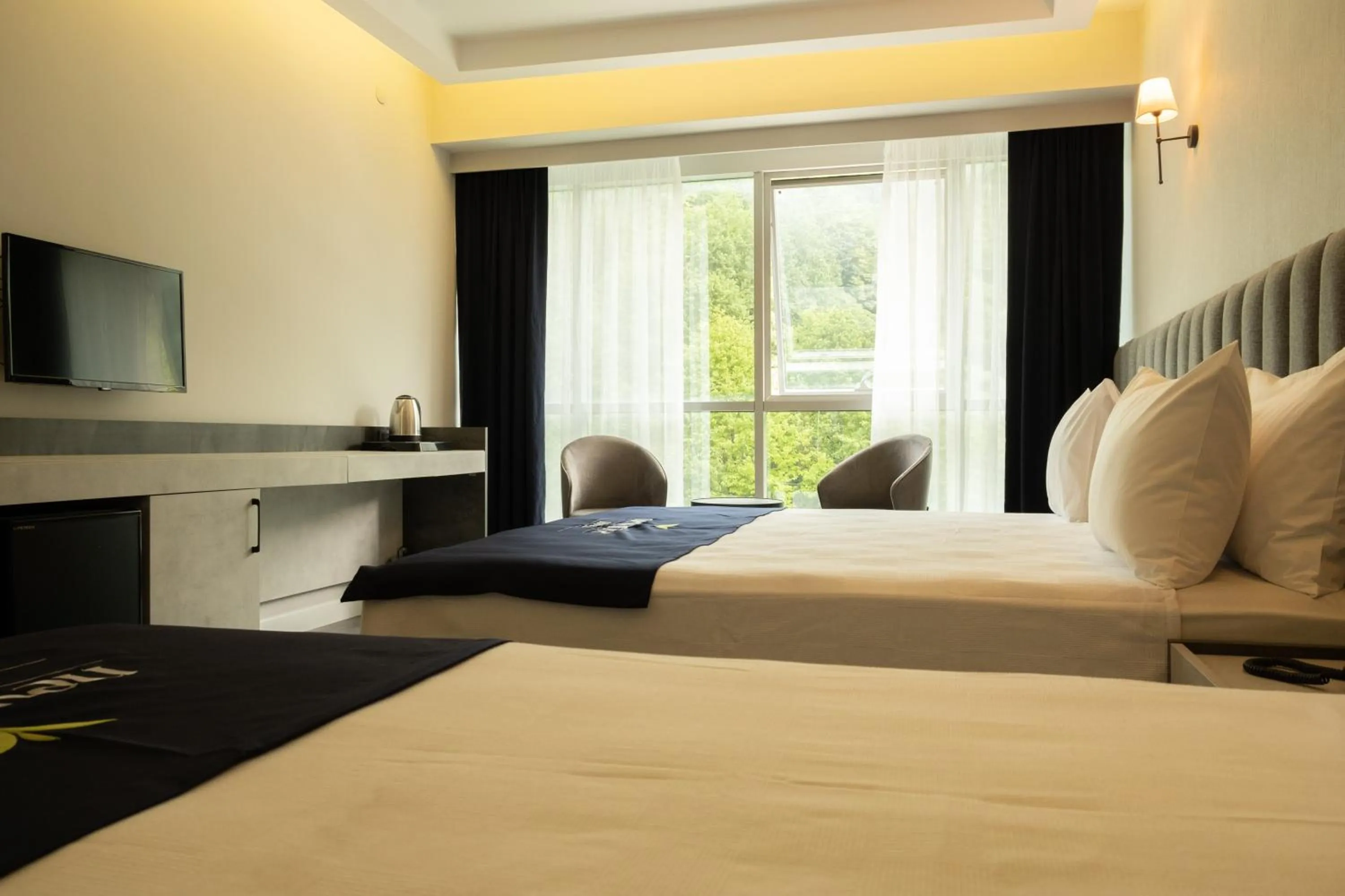 Bed in Newarise Hotel