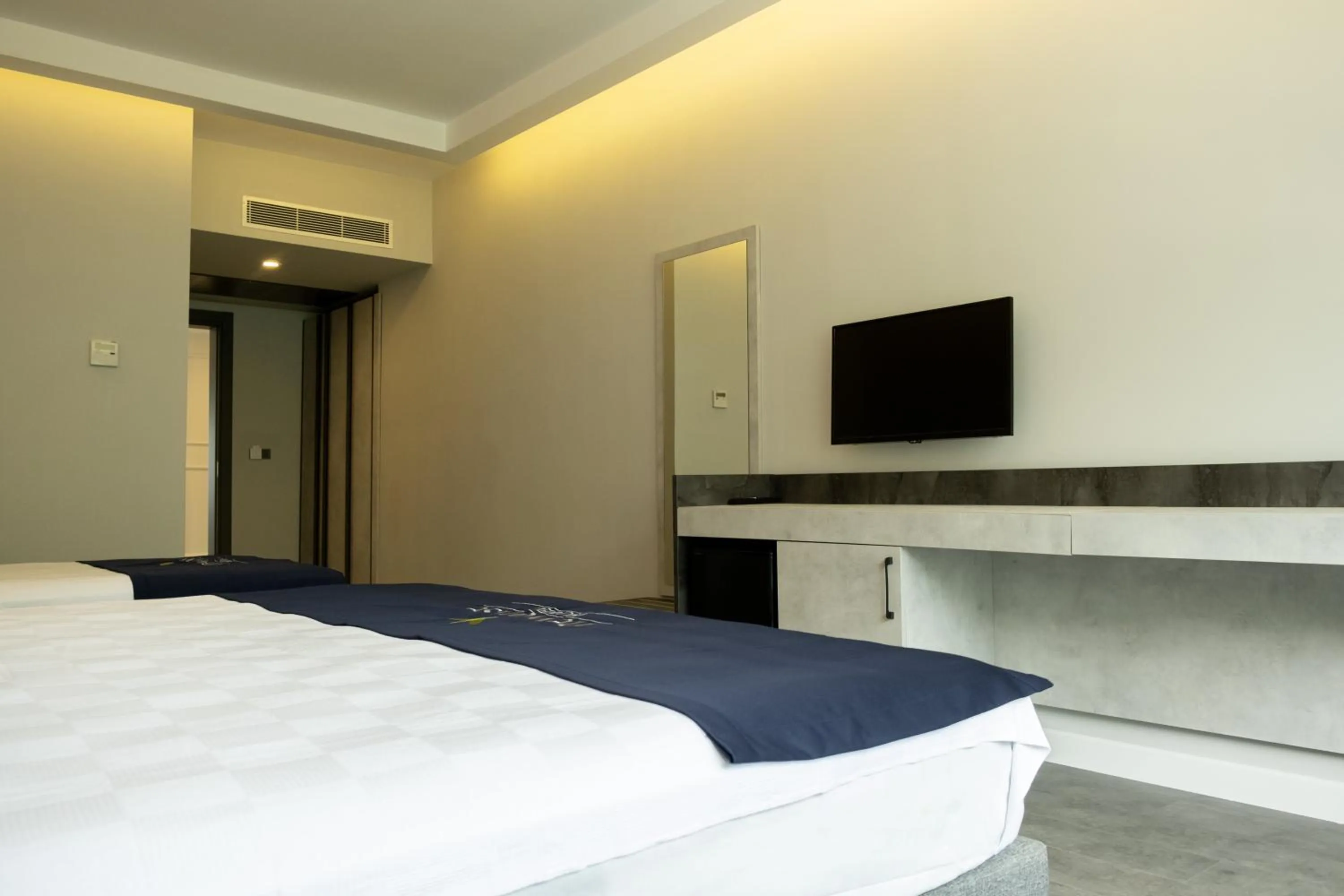 Bed in Newarise Hotel