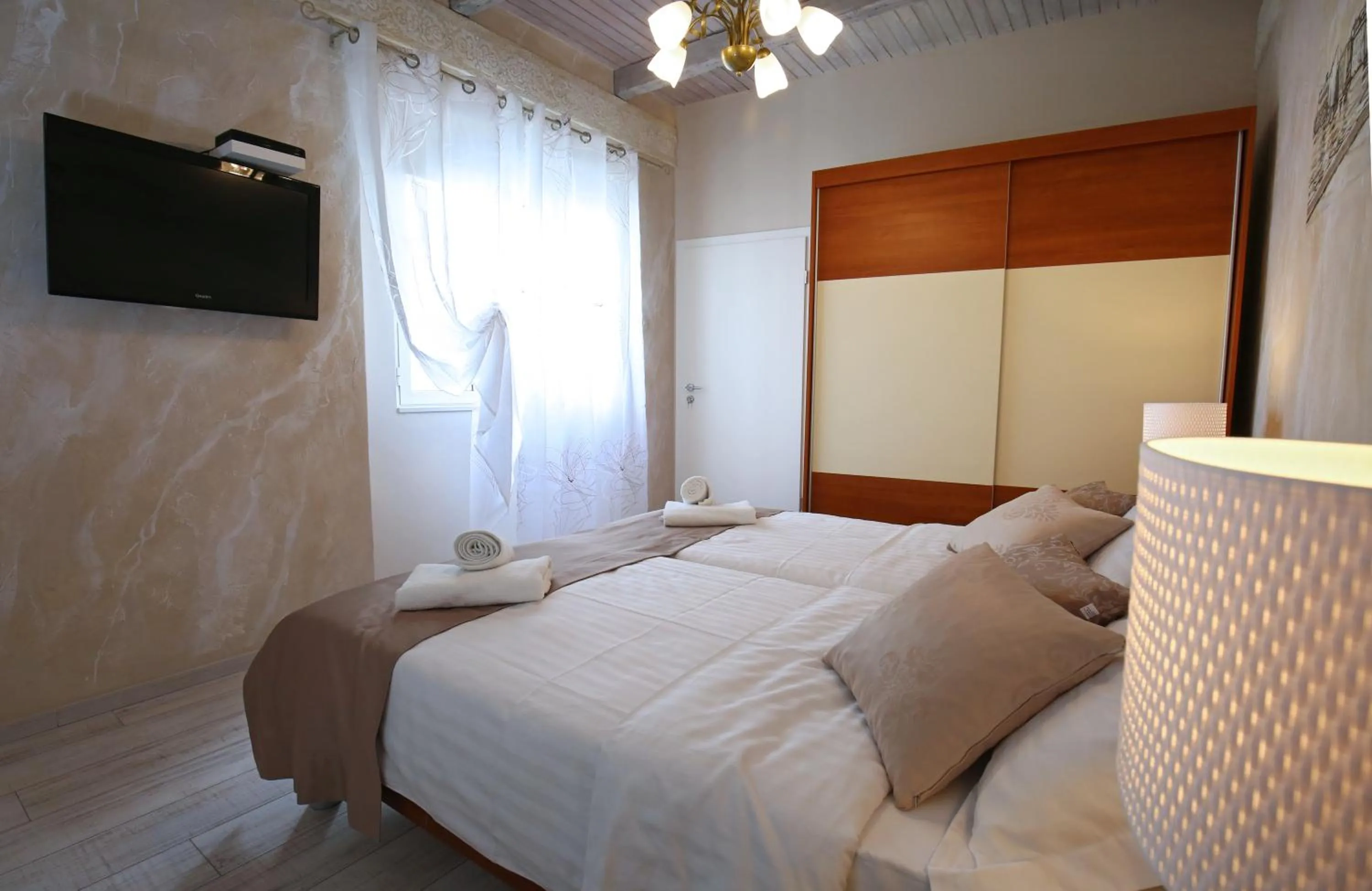 Bed in Luxury Lidija Rooms