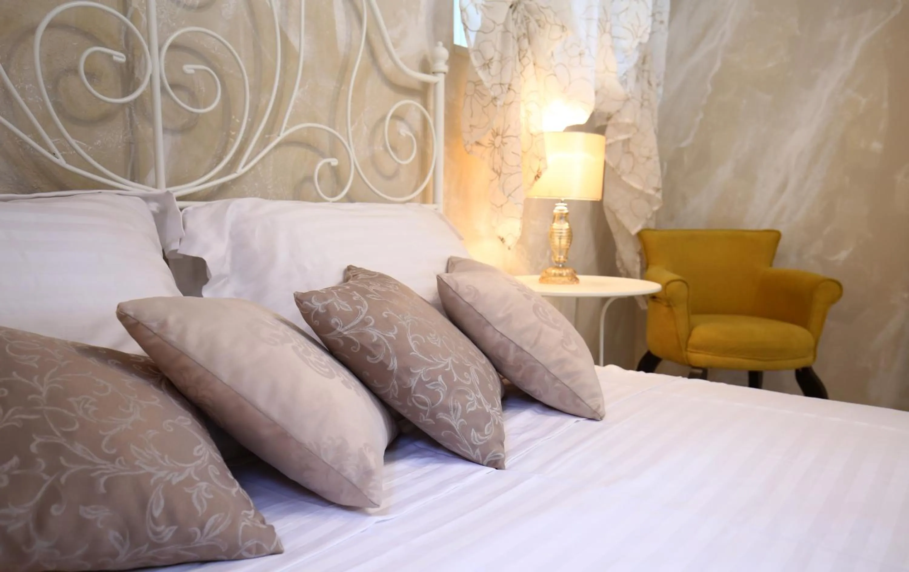 Decorative detail, Bed in Luxury Lidija Rooms