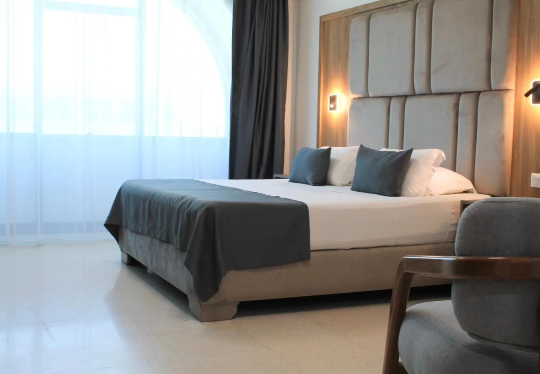 Bed in PALACE APPART HOTEL