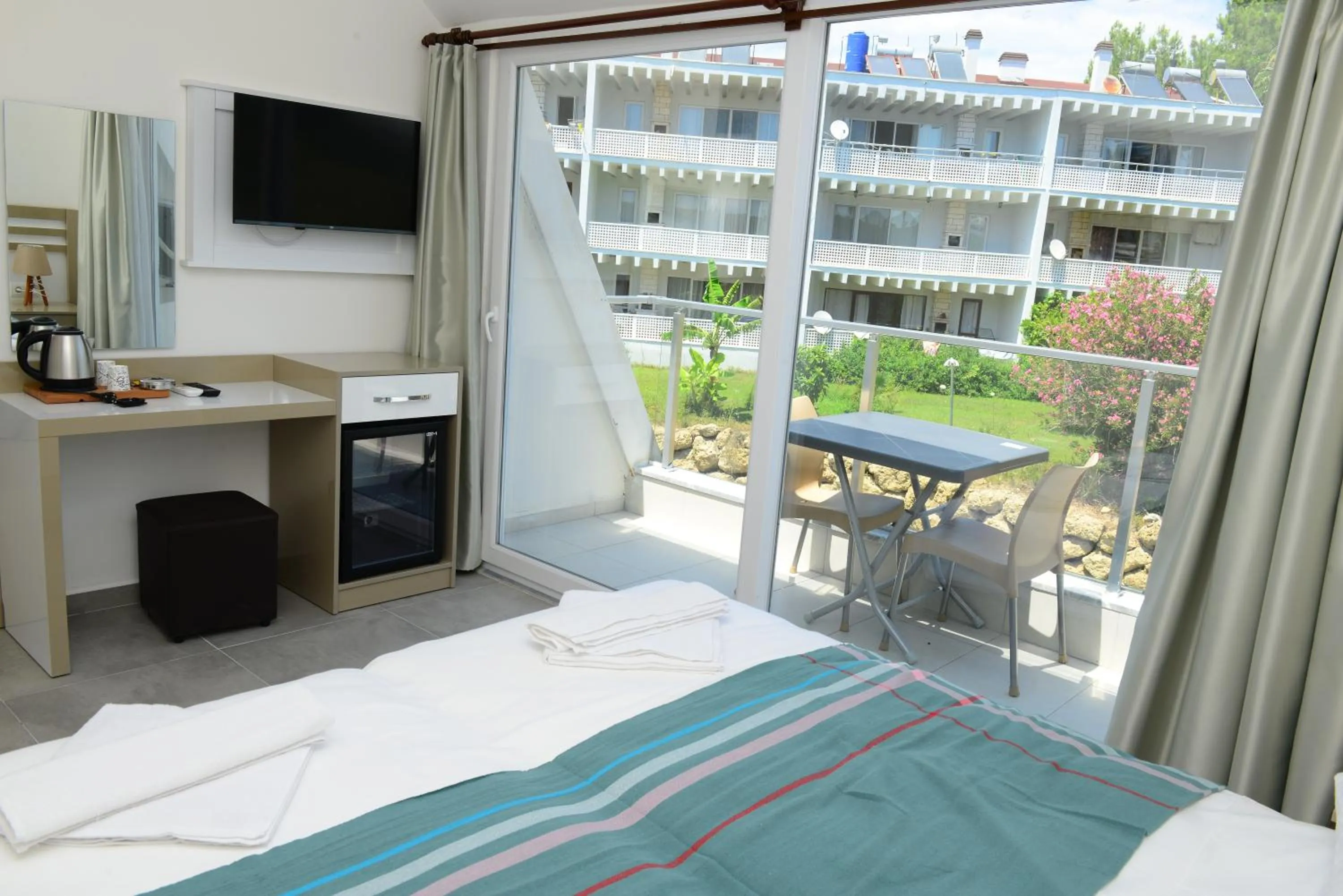 TV and multimedia in Lofts Alanya Lina Hotel