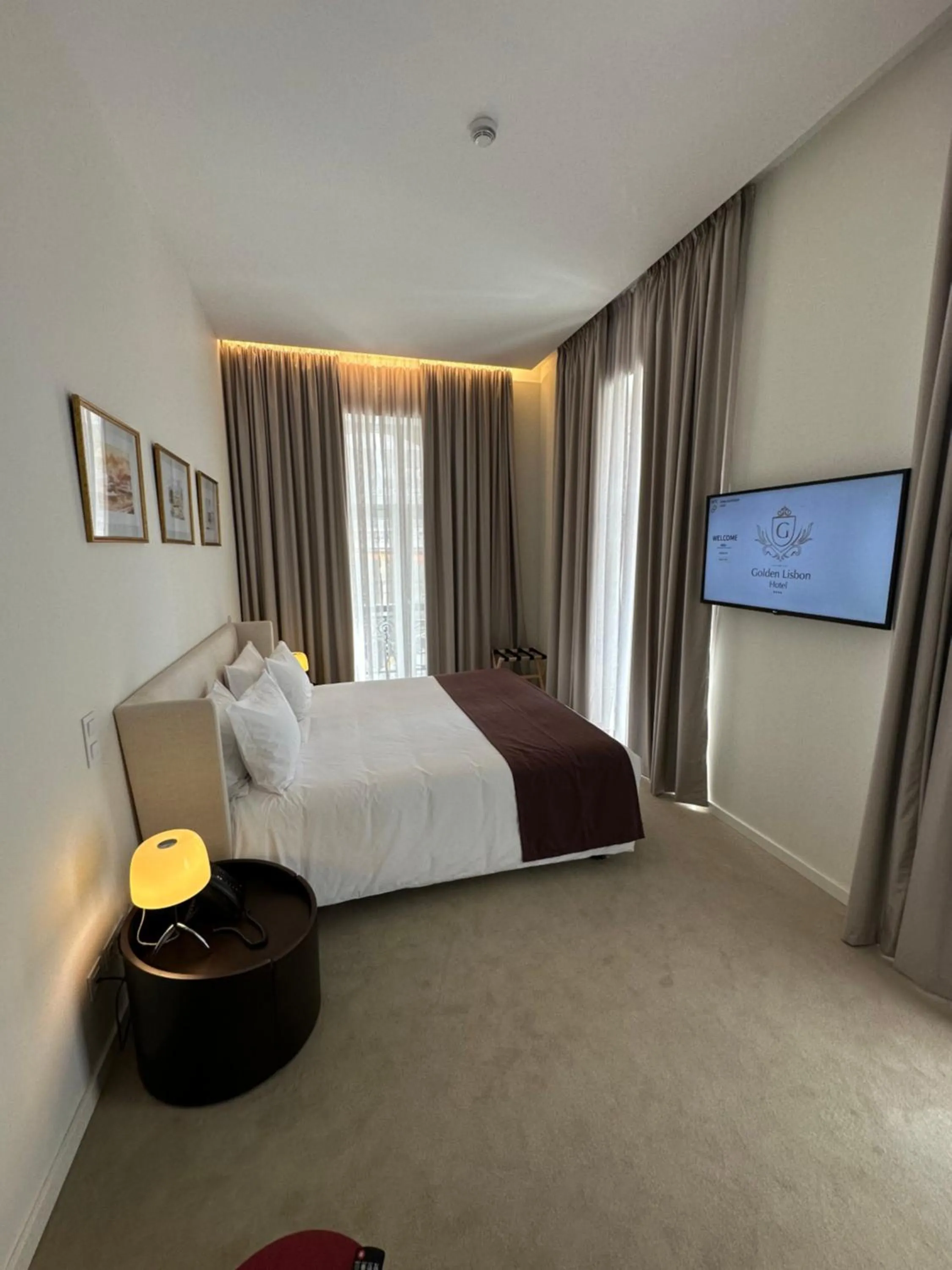 Bed in Golden Lisbon Hotel