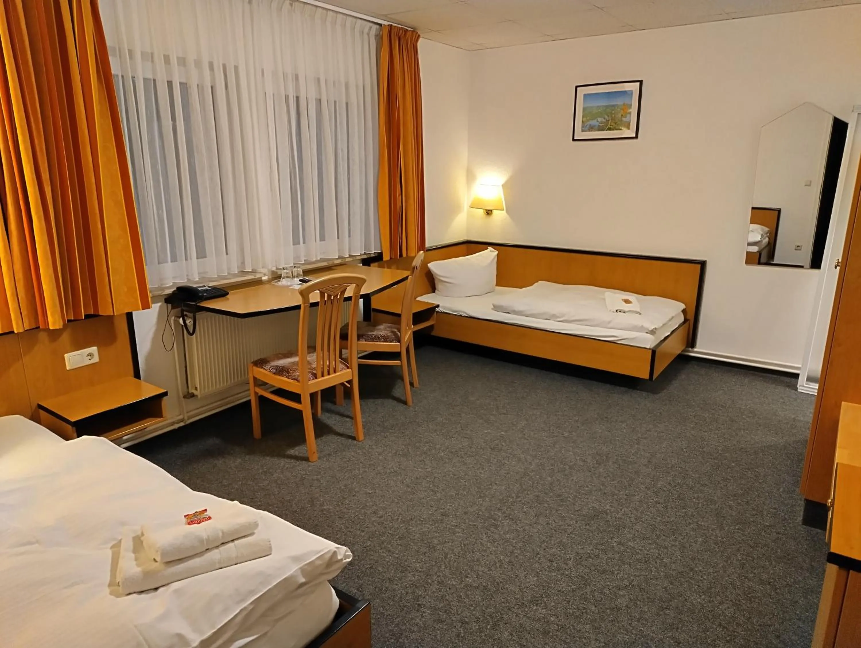 Photo of the whole room, Bed in Hotel Seeschlösschen