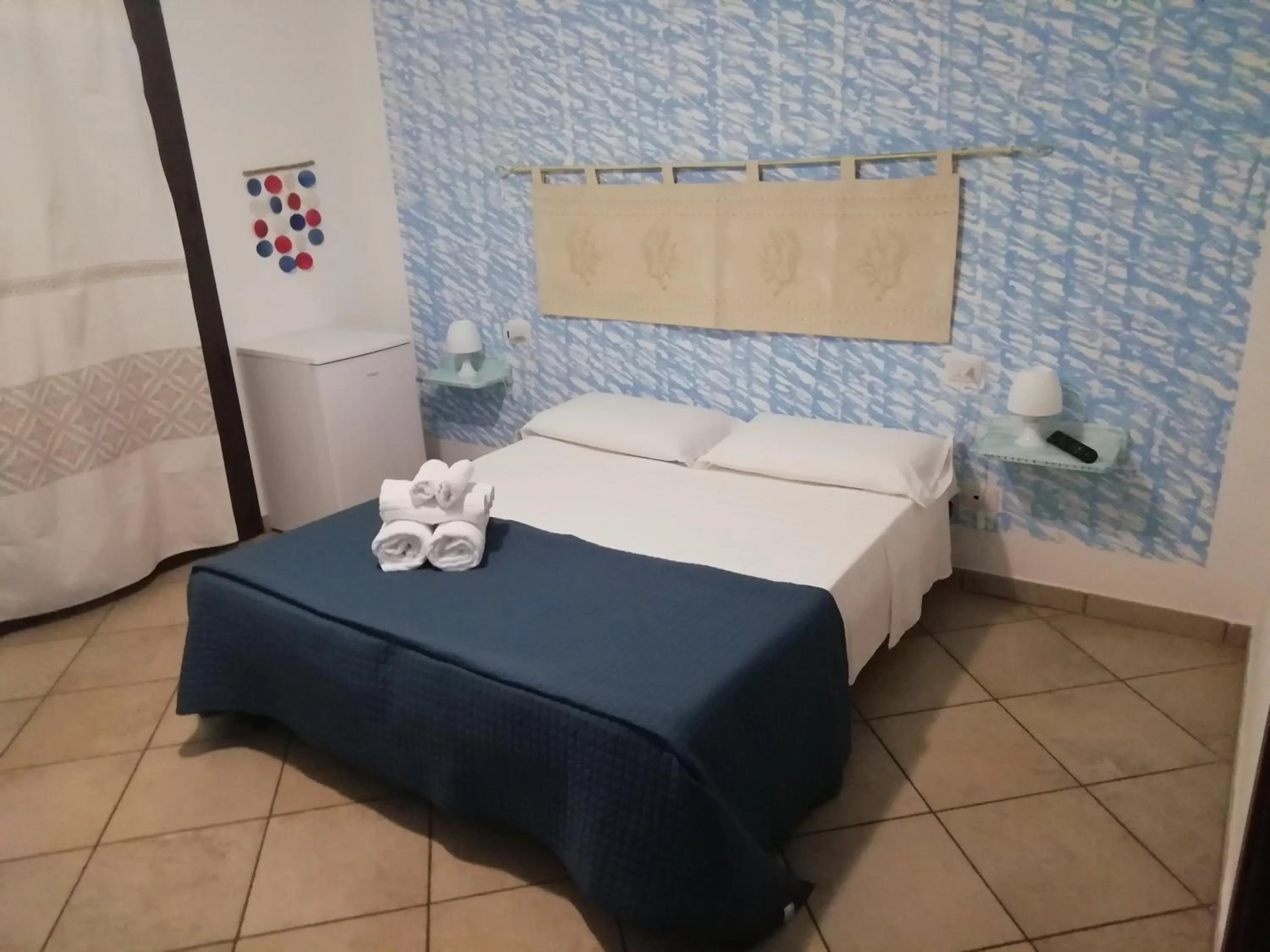 Bed in B&B Acquamarina Villasimius