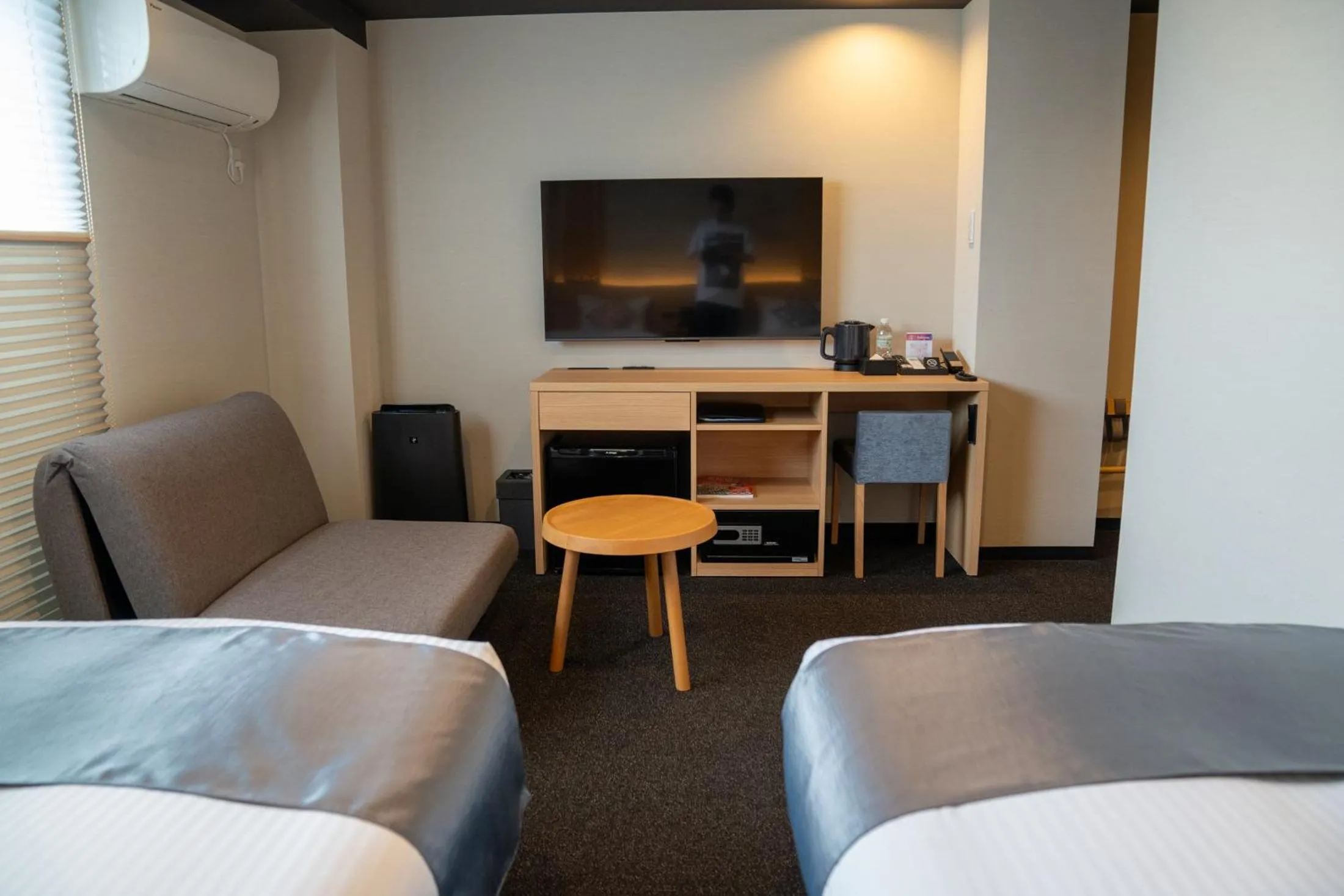 Bed in Tabist kiki HOTEL KYOTO Gojo Karasuma