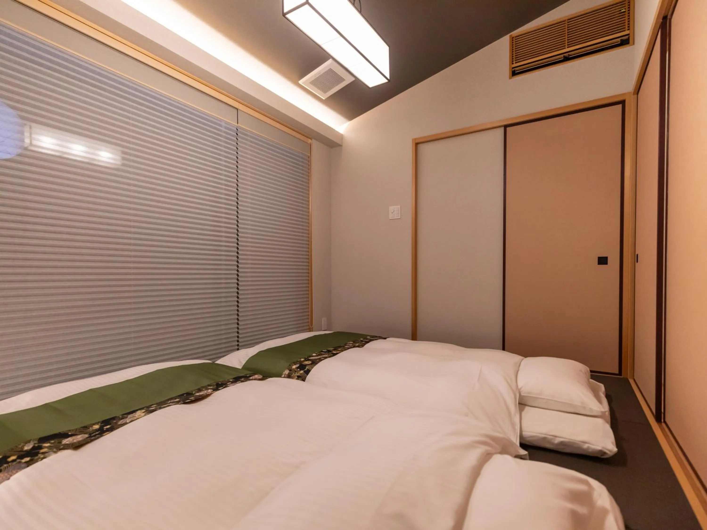 Photo of the whole room, Bed in Tabist kiki HOTEL KYOTO Gojo Karasuma