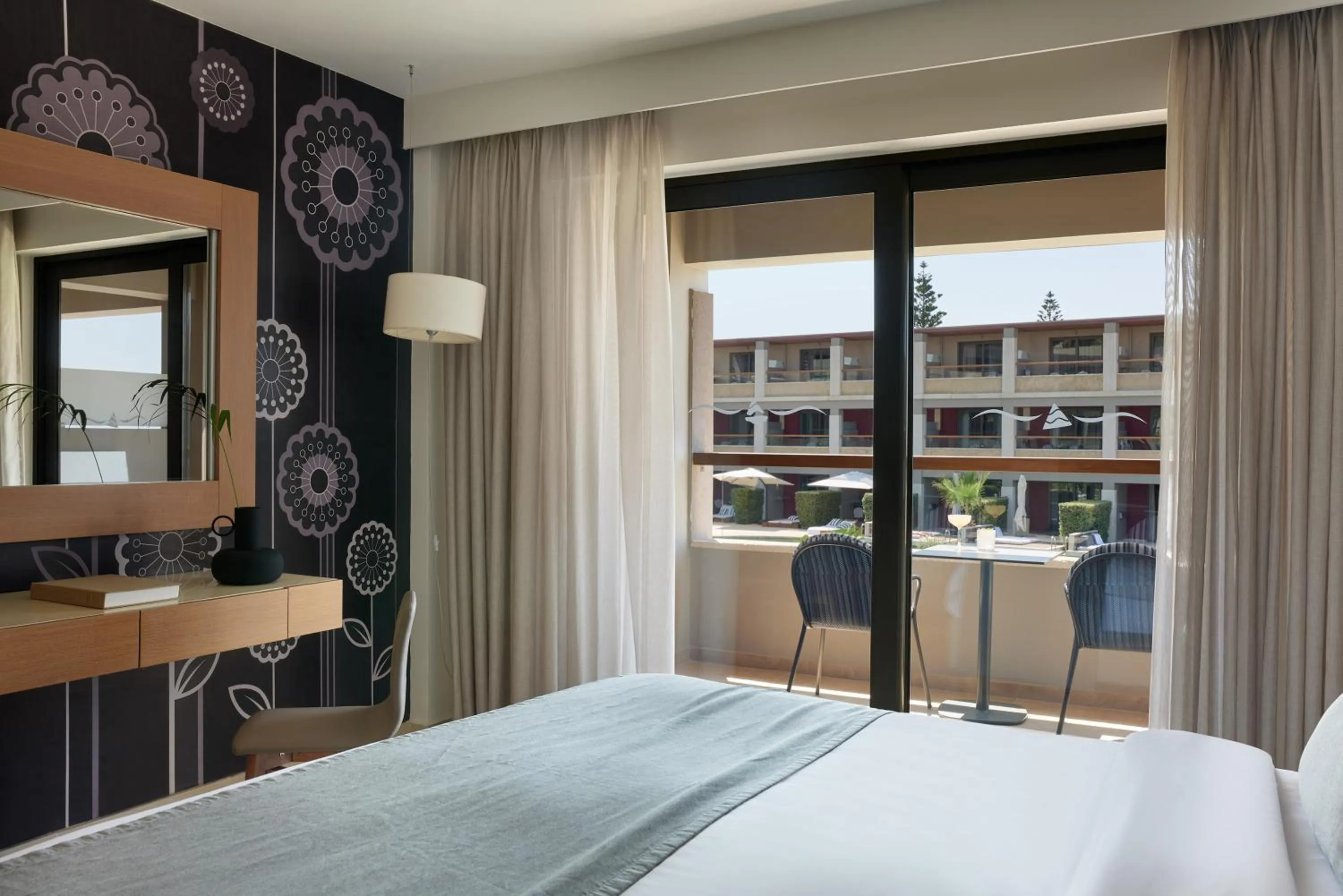 Bed in Atlantica Kalliston Resort - Adults Only