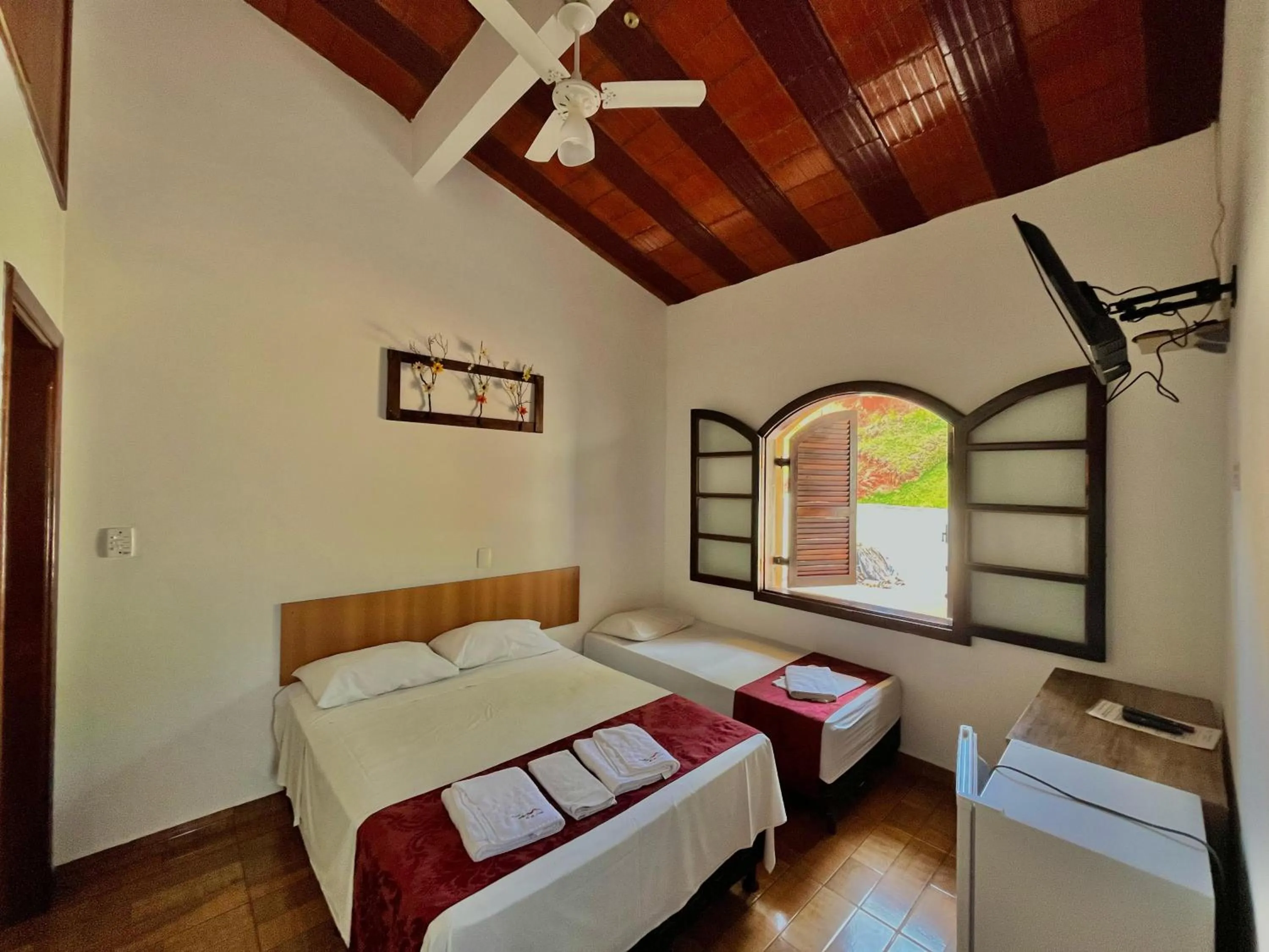 Bed in Pousada Pé da Serra