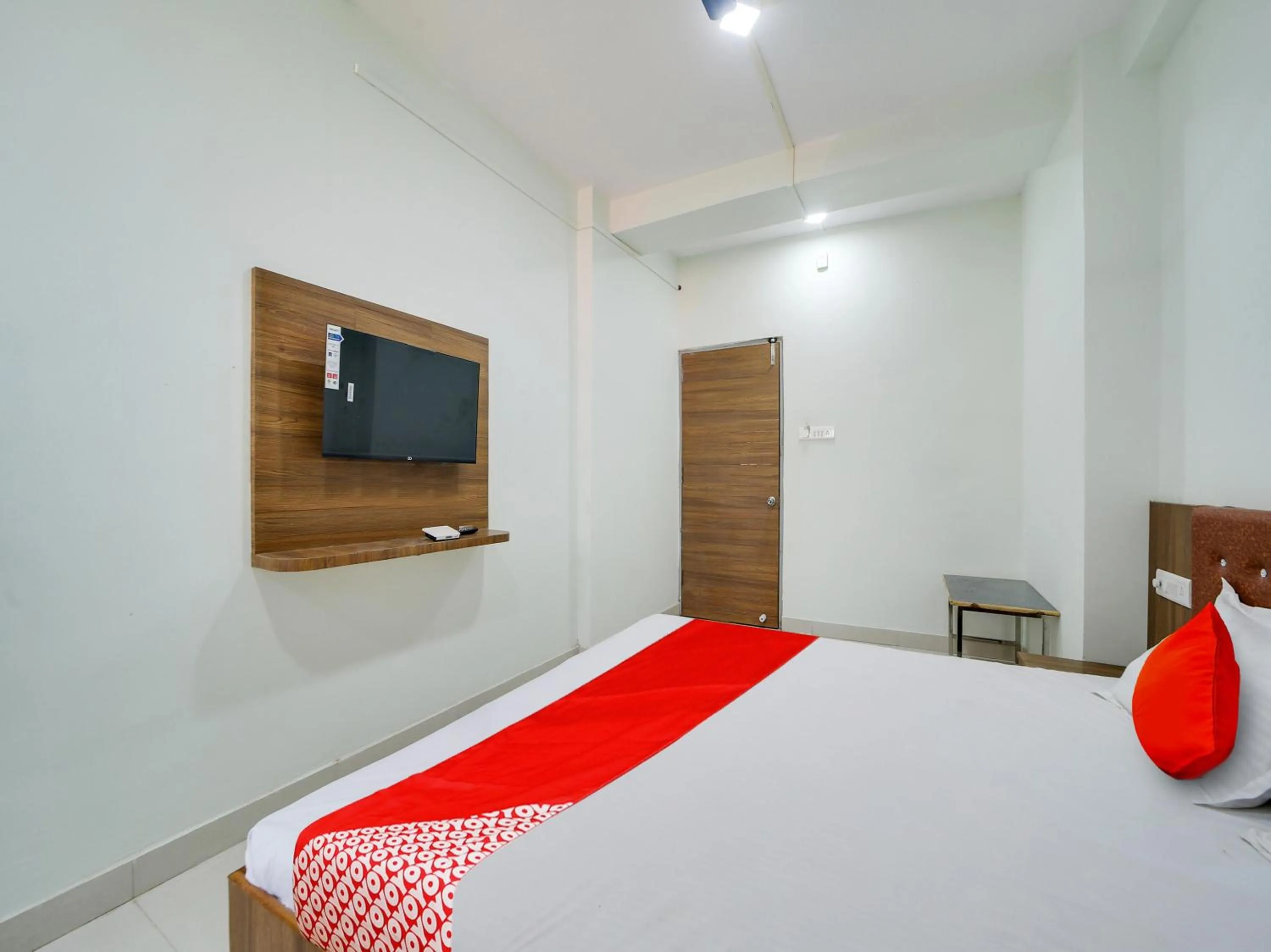 Bedroom in Super Hotel O Lalit And Marriage Garden