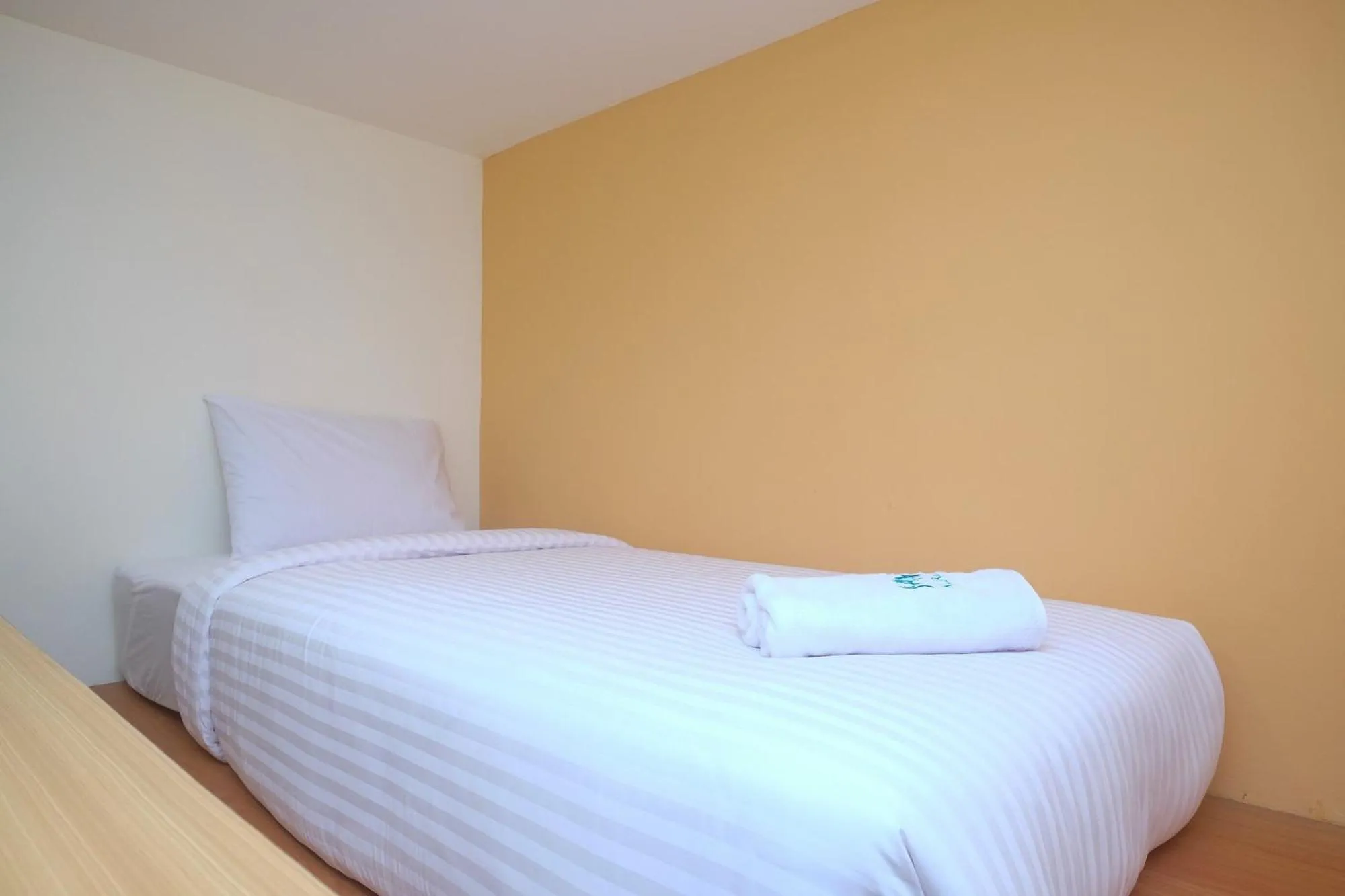 Bed in Sans Hotel Aurum Majapahit Semarang