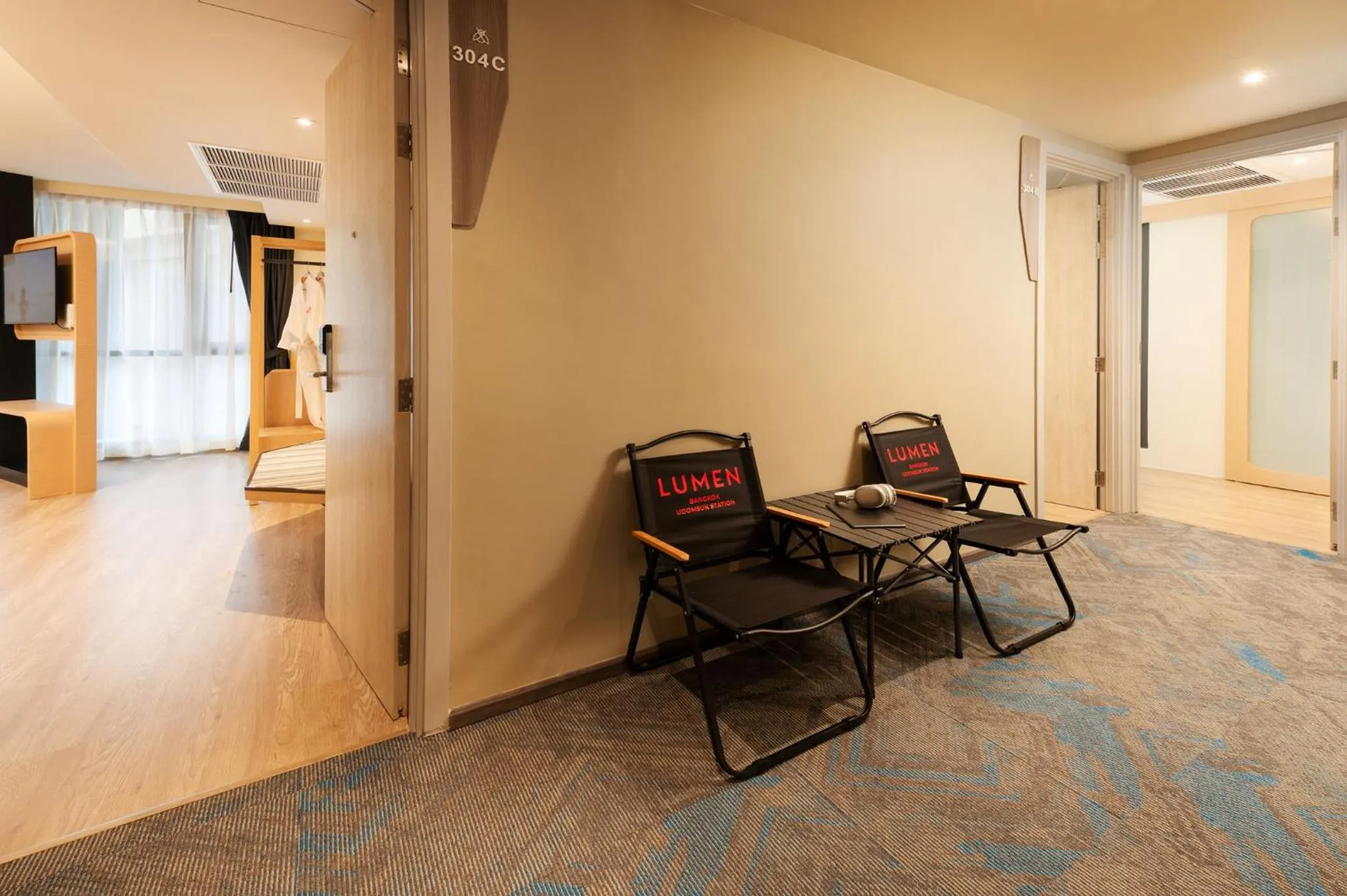 Living room in Lumen Bangkok Udomsuk Station