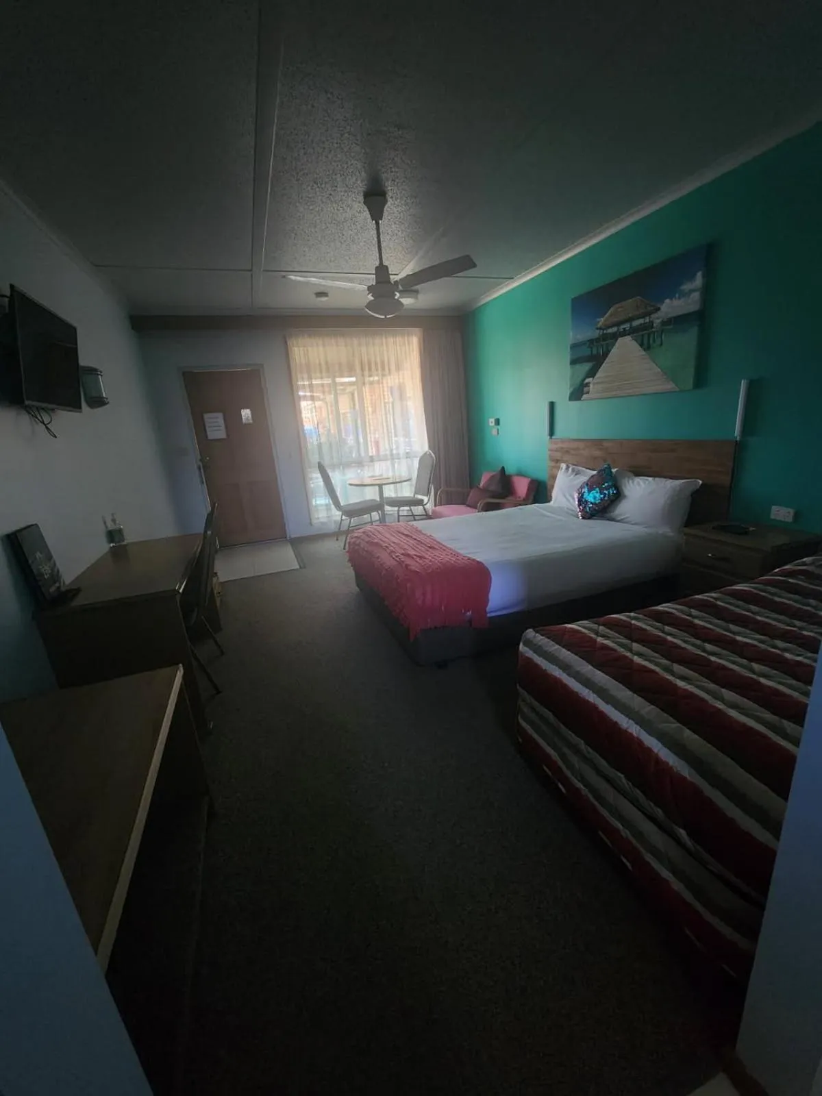 Bed in Acacia Rose Motor Inn