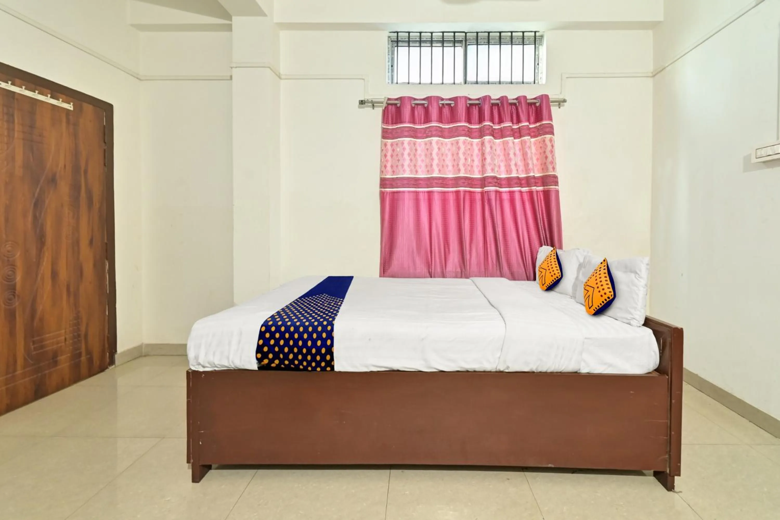 Bedroom, Bed in Hotel O Homely Residency