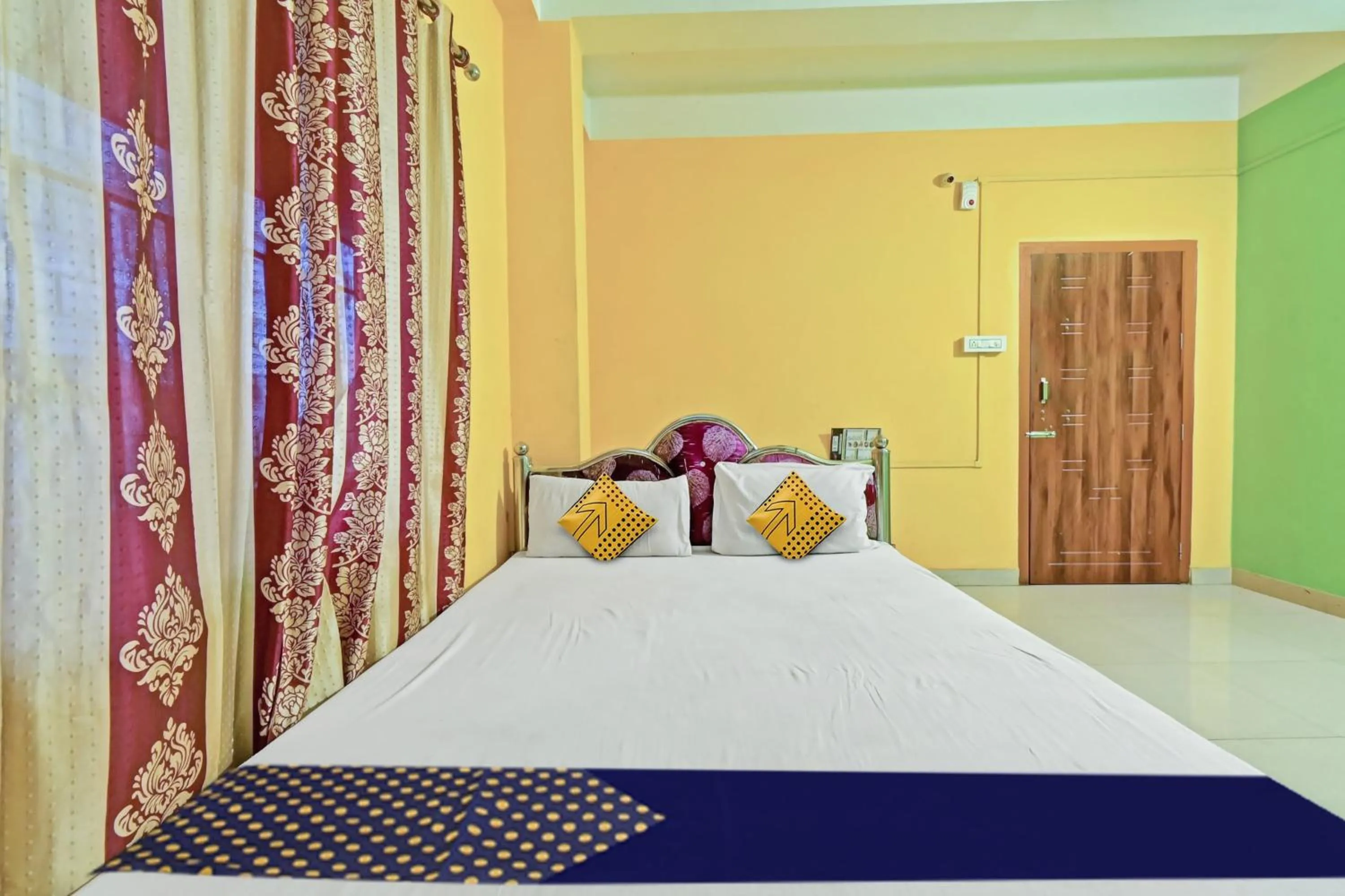 Bedroom, Bed in Hotel O Homely Residency