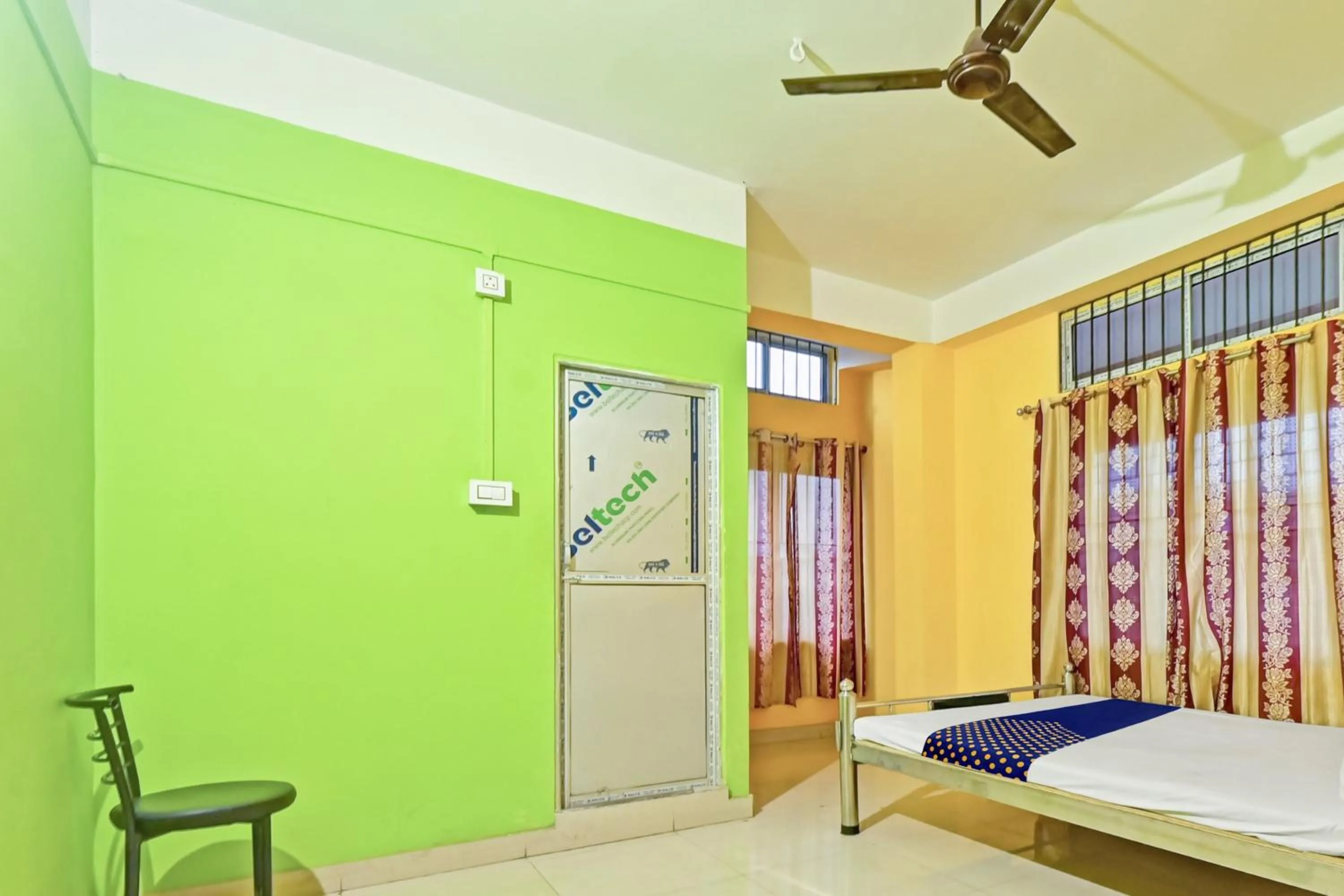 Bedroom, Bed in Hotel O Homely Residency