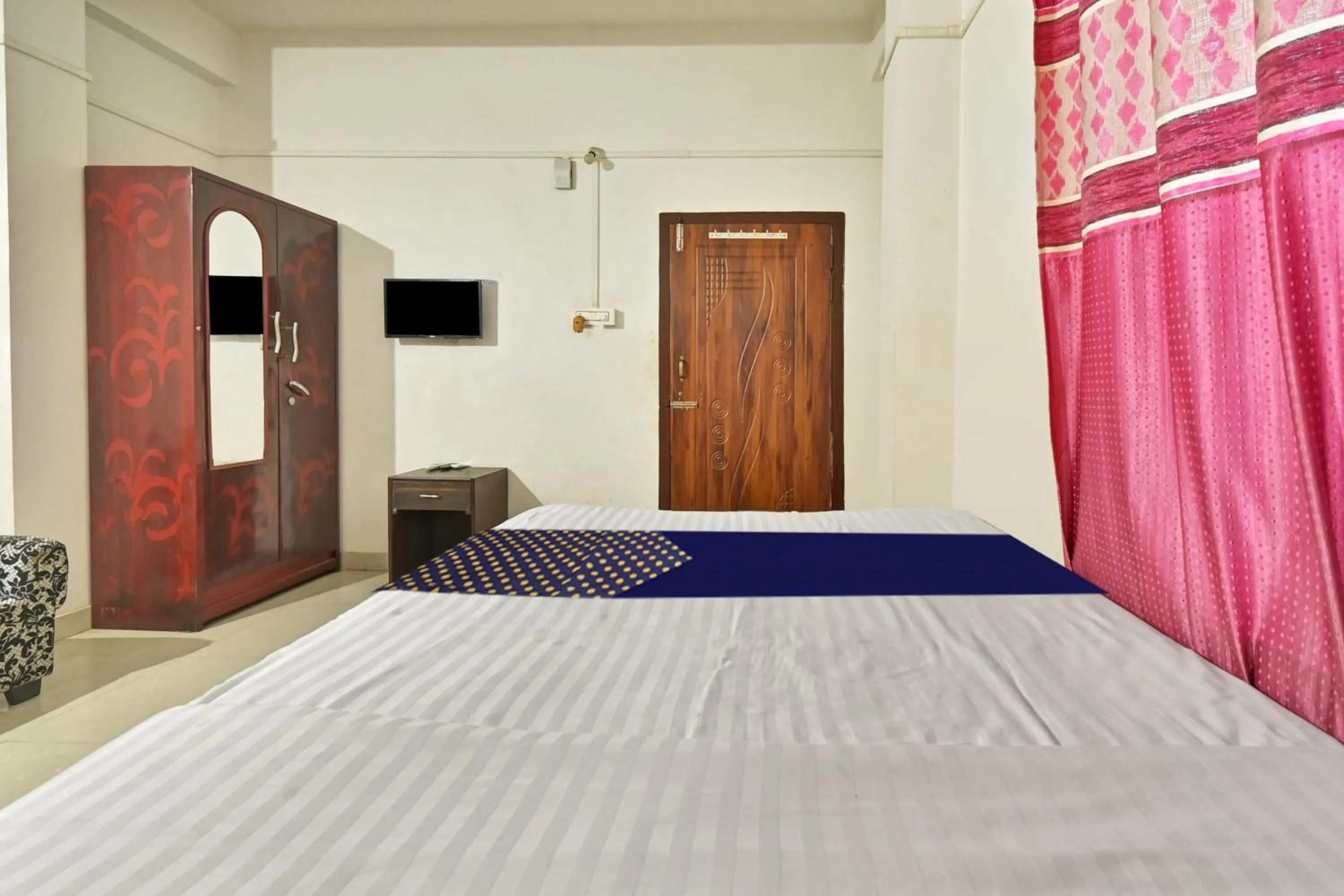 Bedroom, Bed in Hotel O Homely Residency