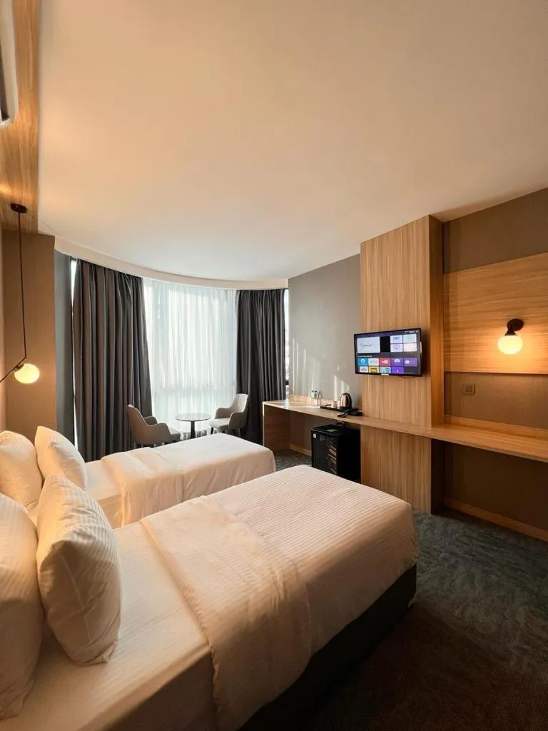 Bed in Royal Mass Airport Business Hotel