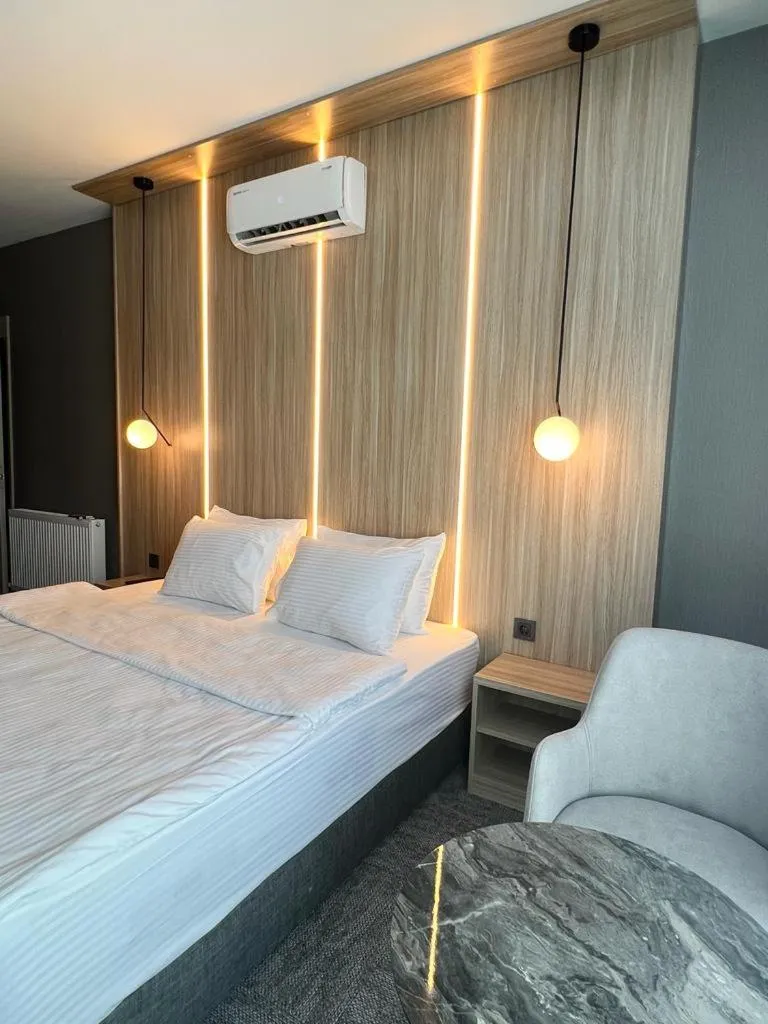 Bed in Royal Mass Airport Business Hotel