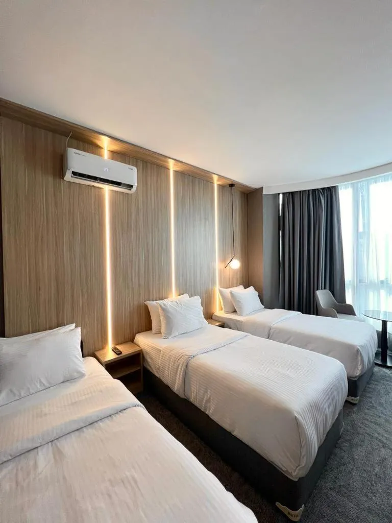 Bed in Royal Mass Airport Business Hotel