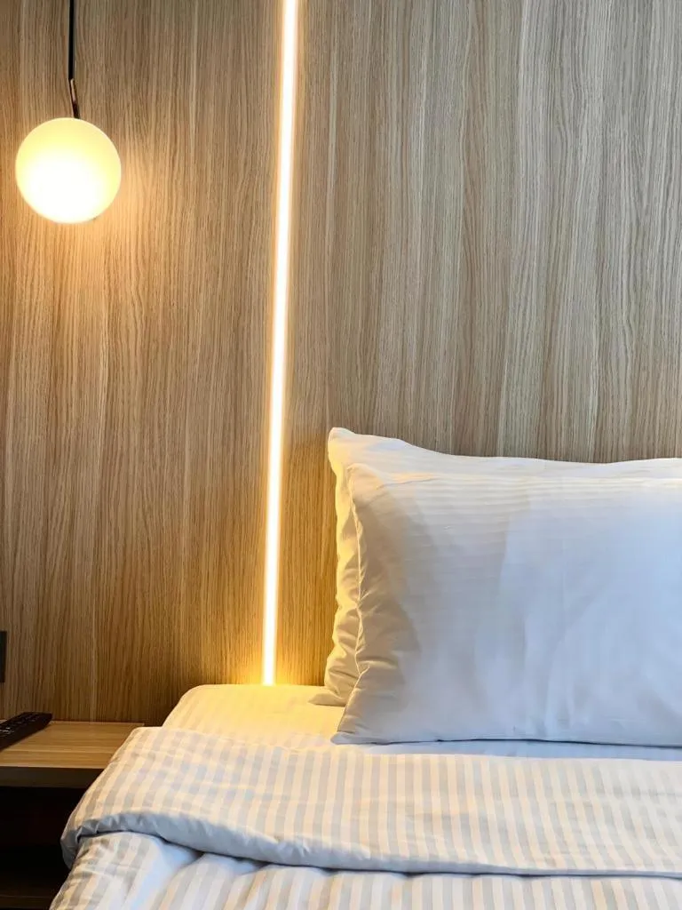 Bed in Royal Mass Airport Business Hotel