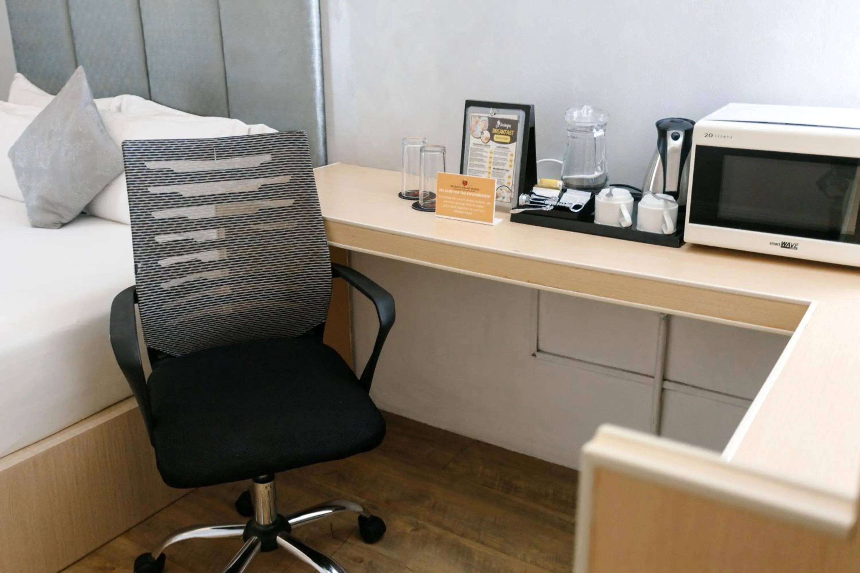 Bed in Regency Grand Suites