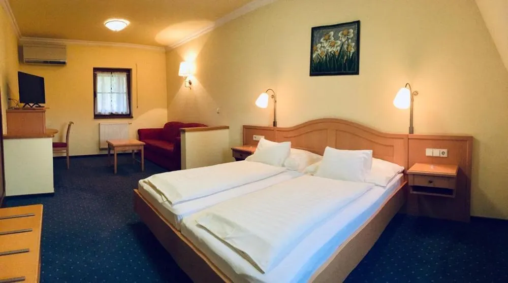 Bed in Hétkúti Wellness Hotel