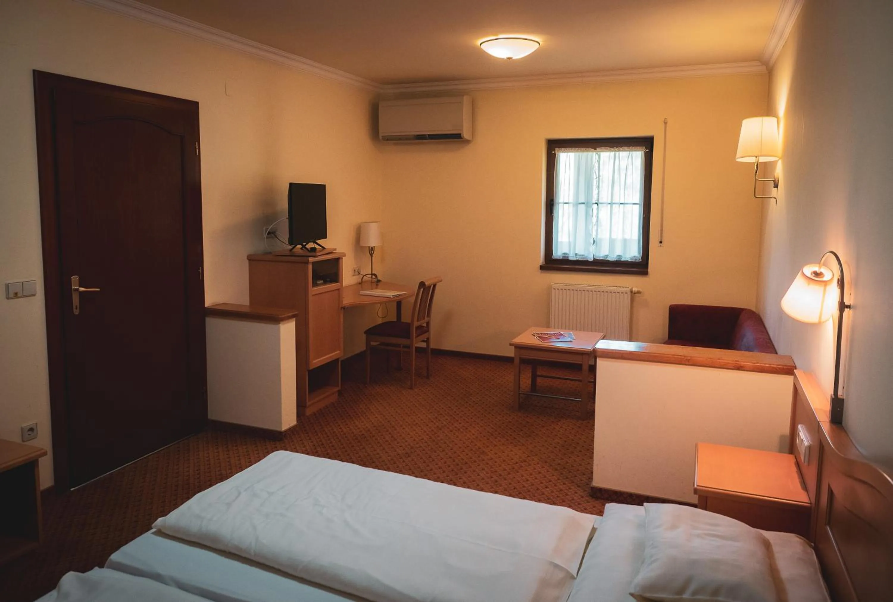 Bed in Hétkúti Wellness Hotel