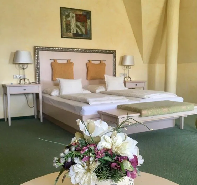 Bed in Hétkúti Wellness Hotel