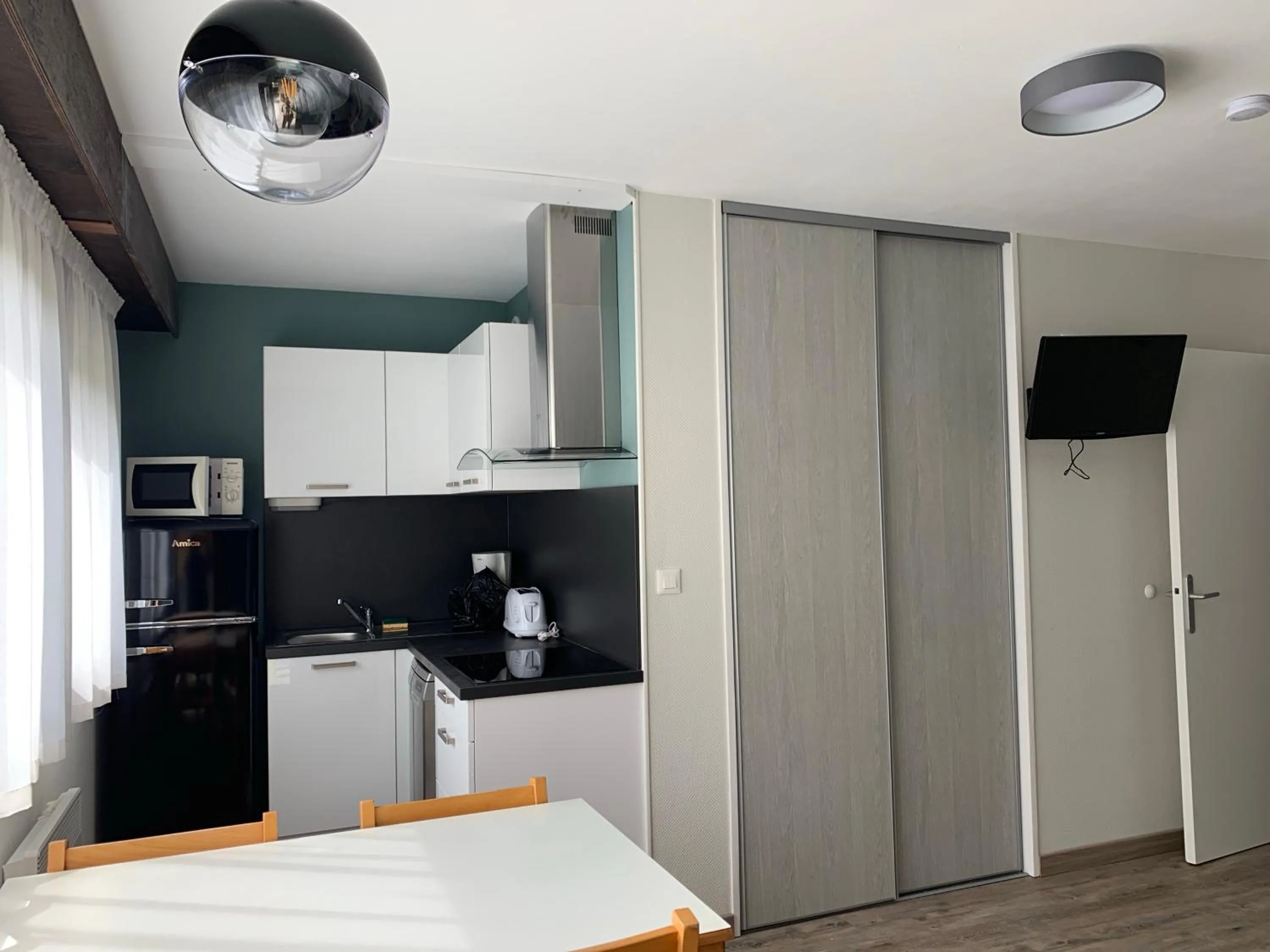 Kitchen or kitchenette in Le Village Vacances de Mimizan Plage