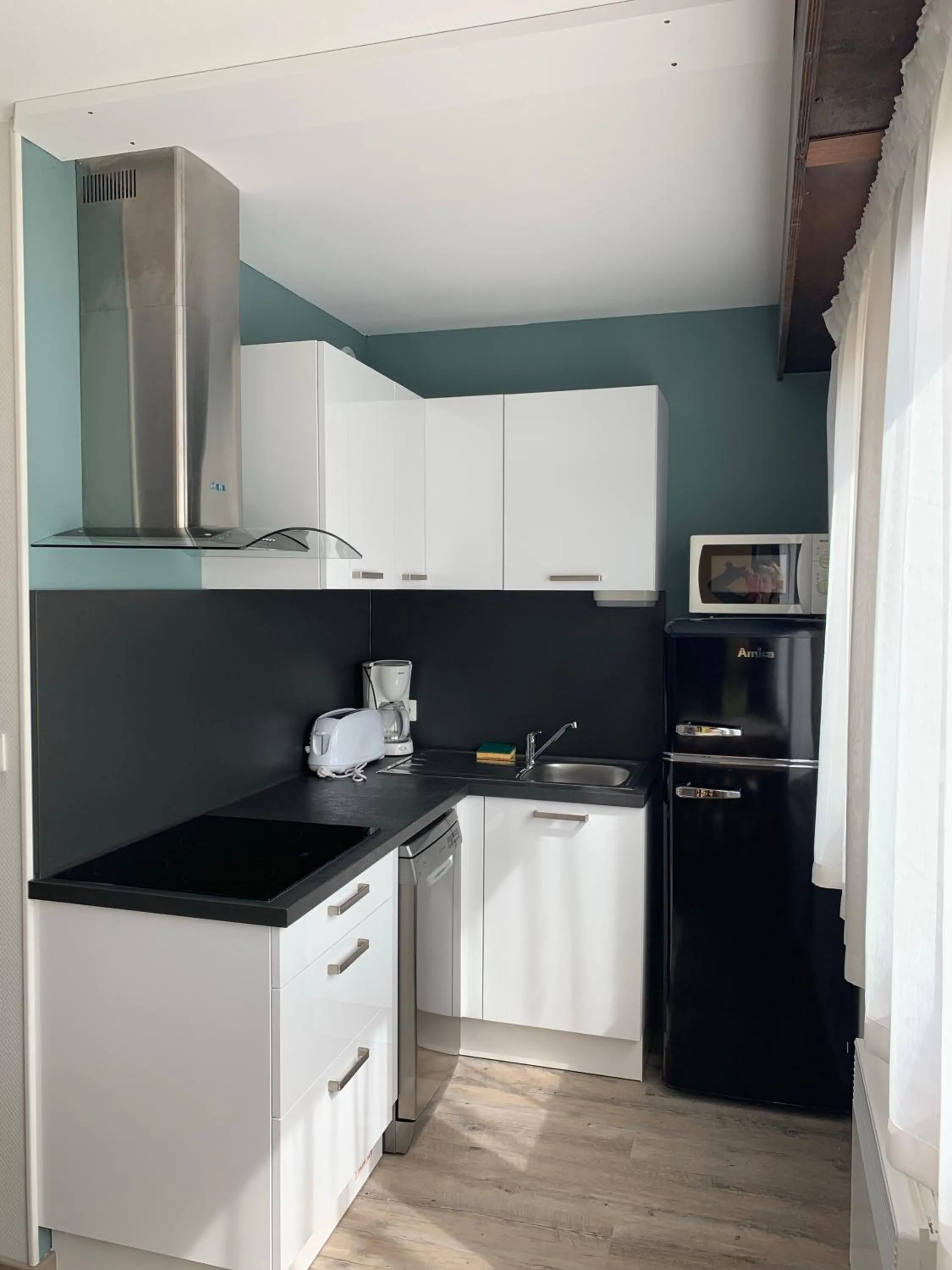 Kitchen or kitchenette in Le Village Vacances de Mimizan Plage