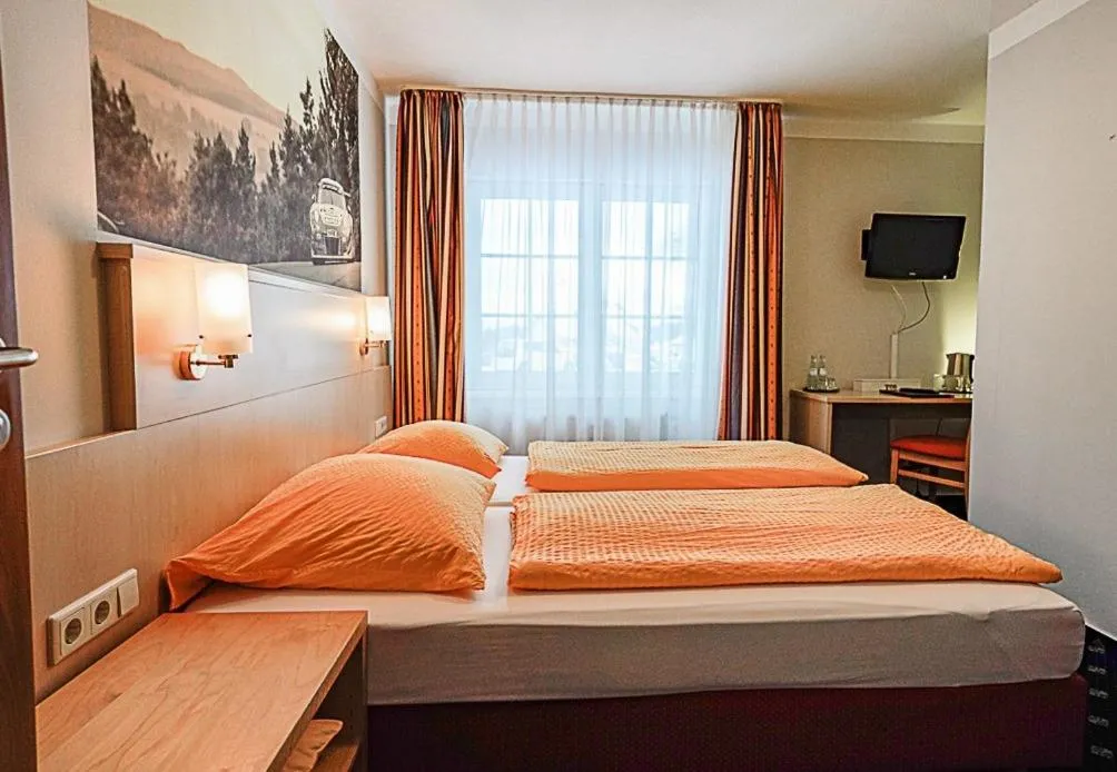 Photo of the whole room, Bed in Gästehaus Fuchshof