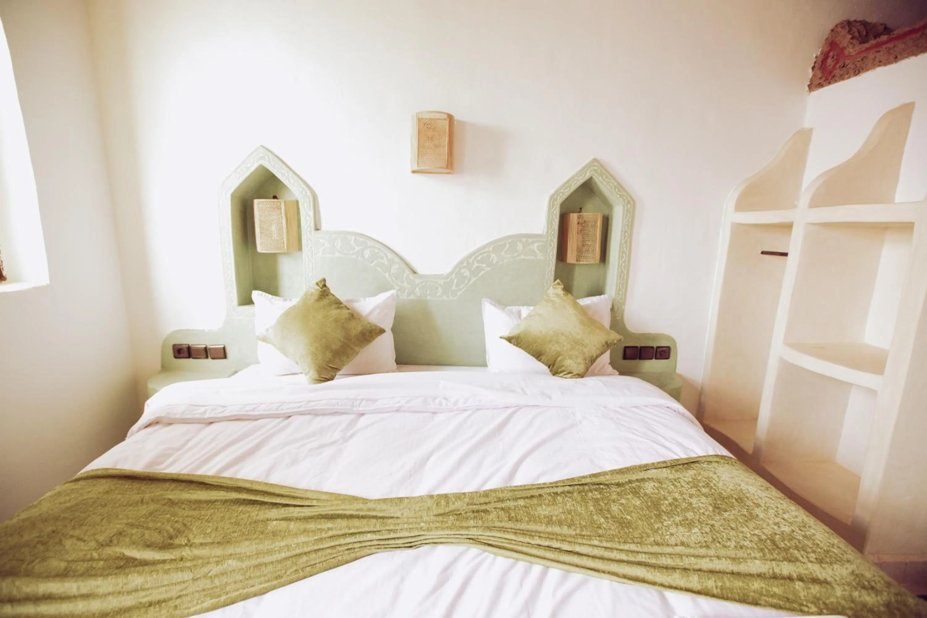 Bed in Riad Merzouga Dunes