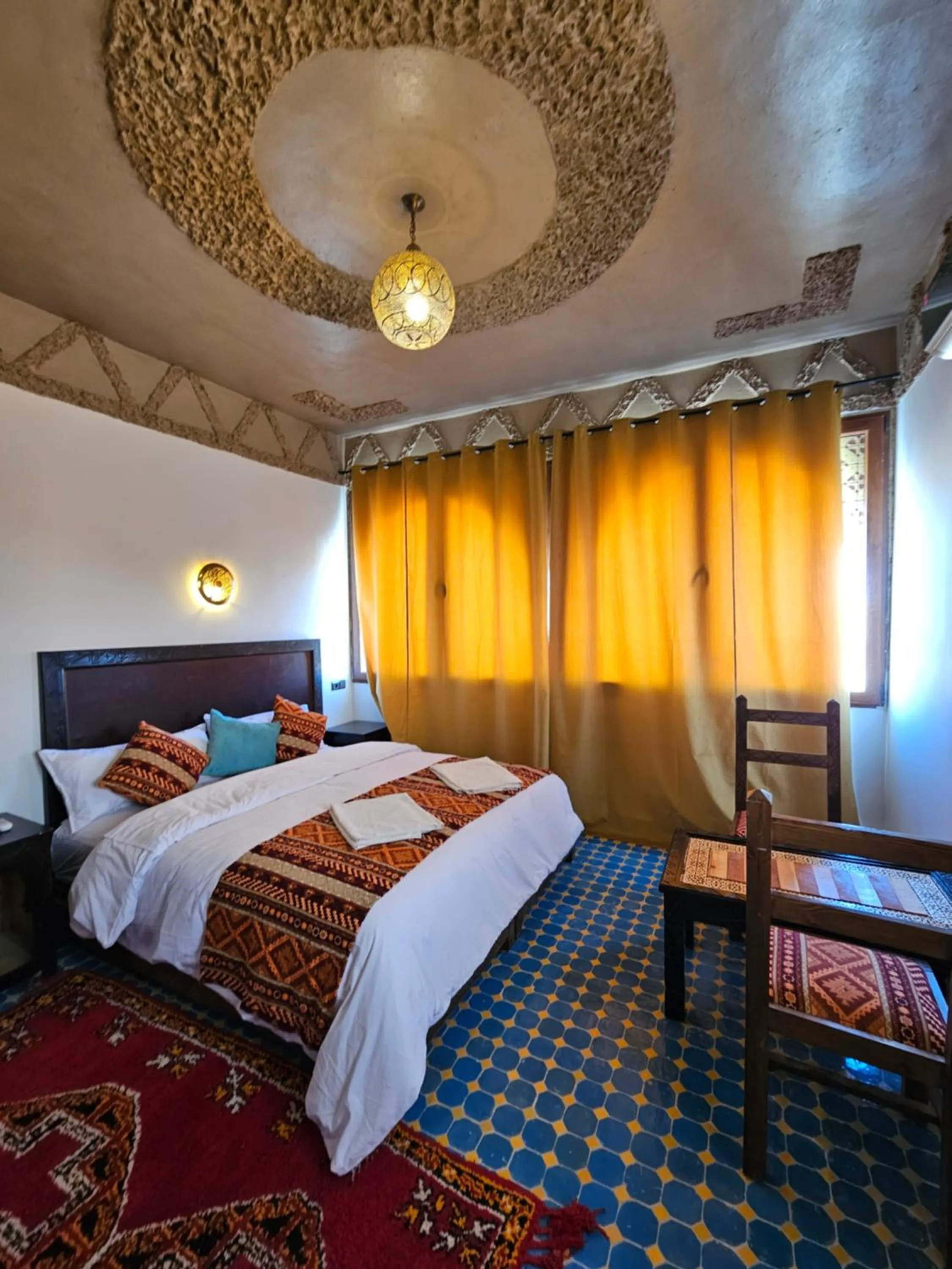 Bed in Riad Merzouga Dunes