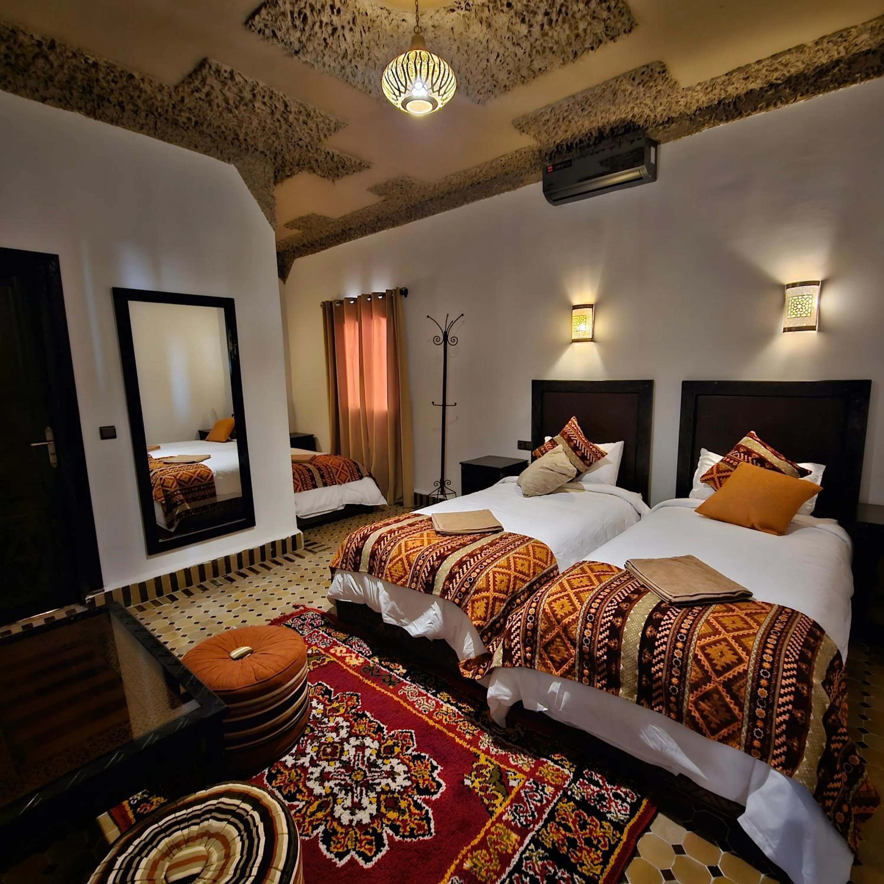 Bed in Riad Merzouga Dunes