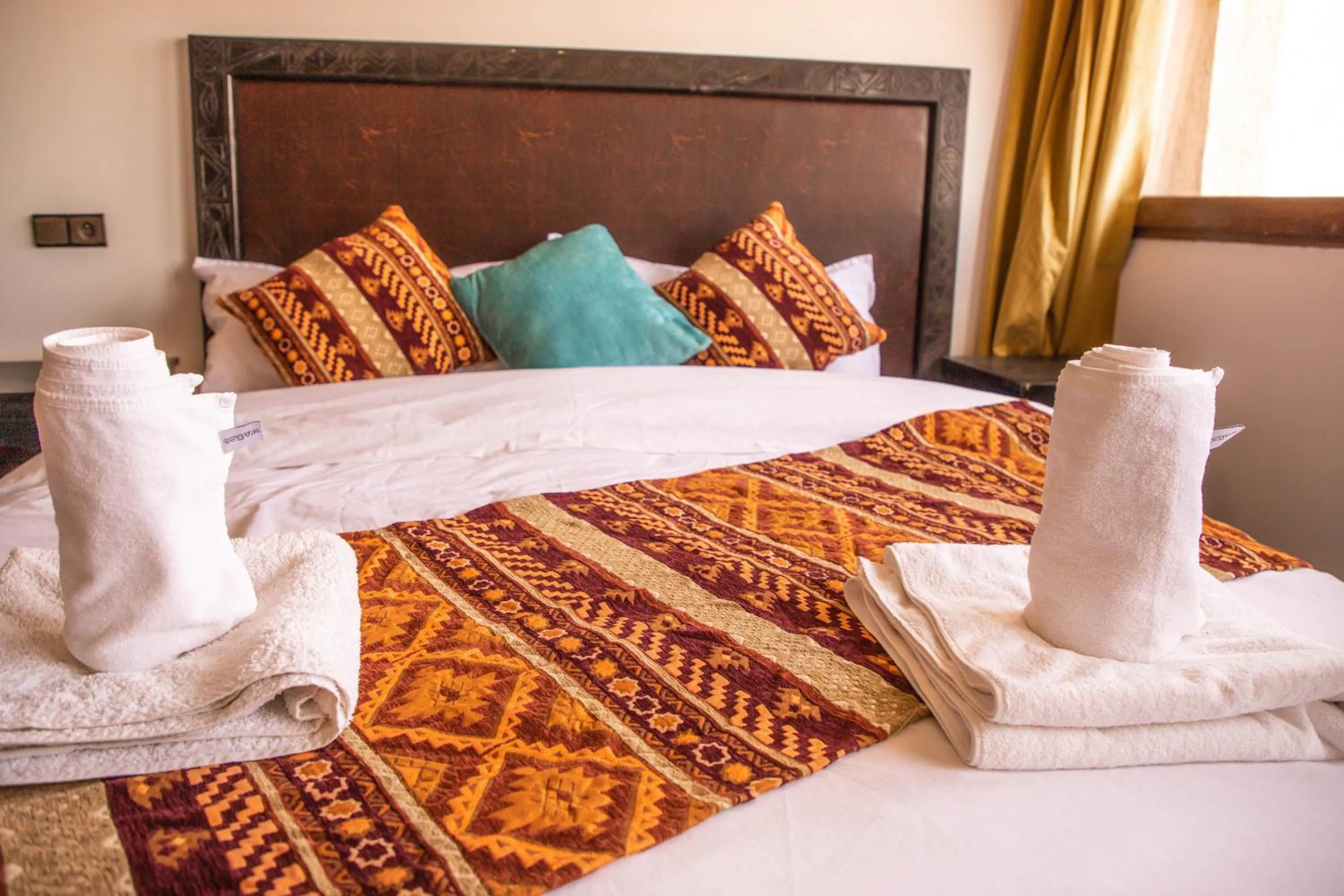Bed in Riad Merzouga Dunes