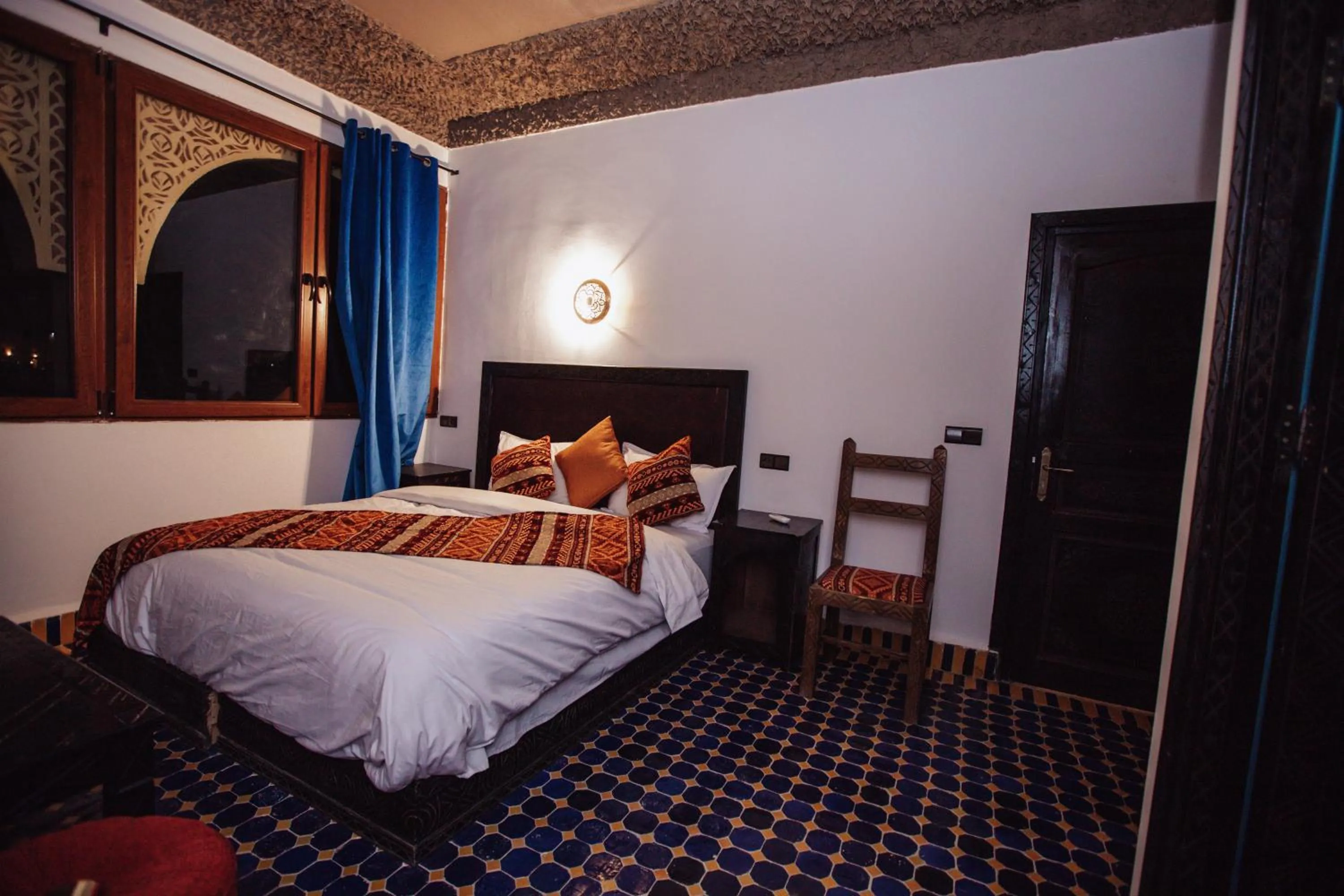 Bed in Riad Merzouga Dunes