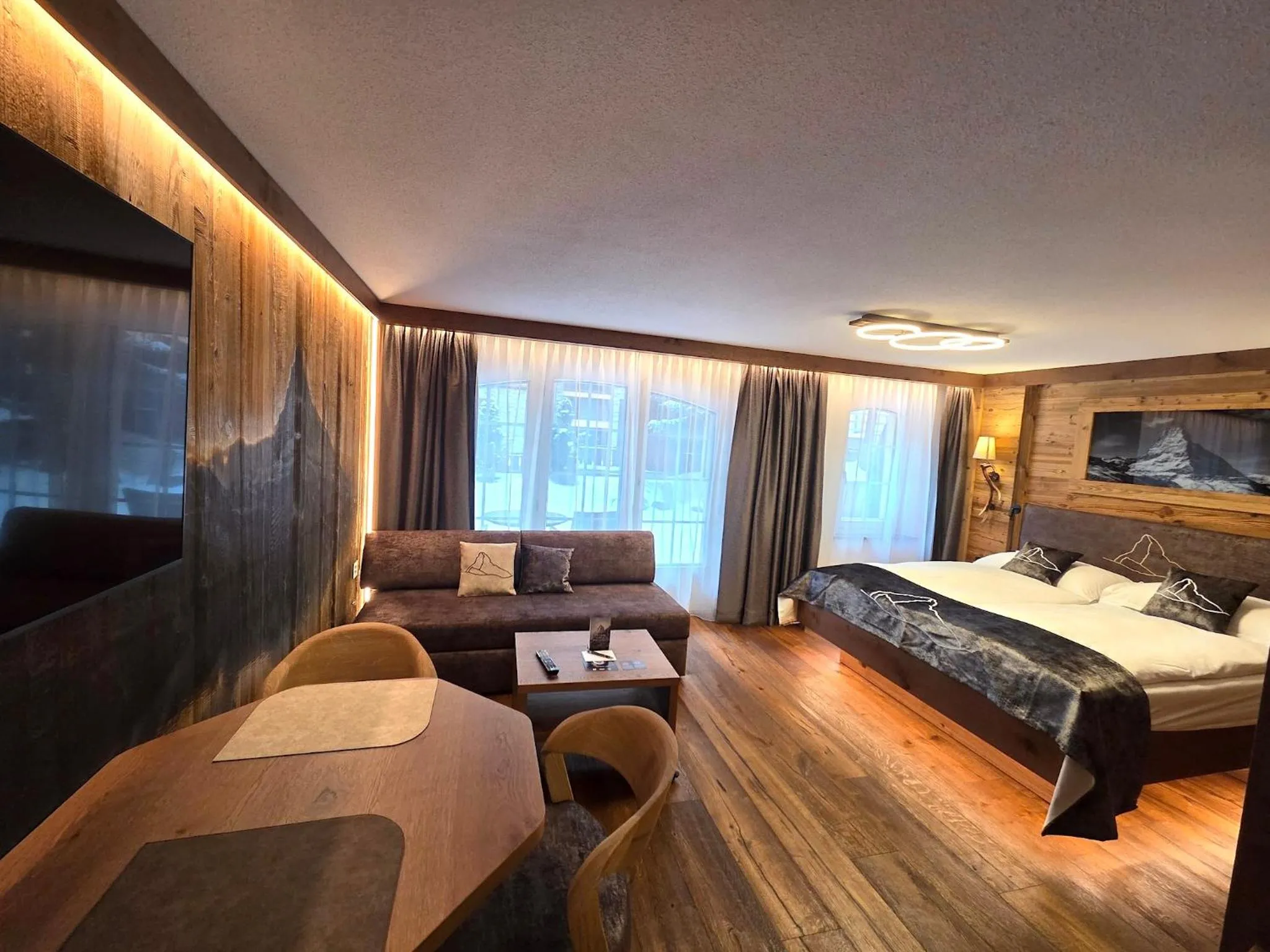 Bed in La Perle Apartments