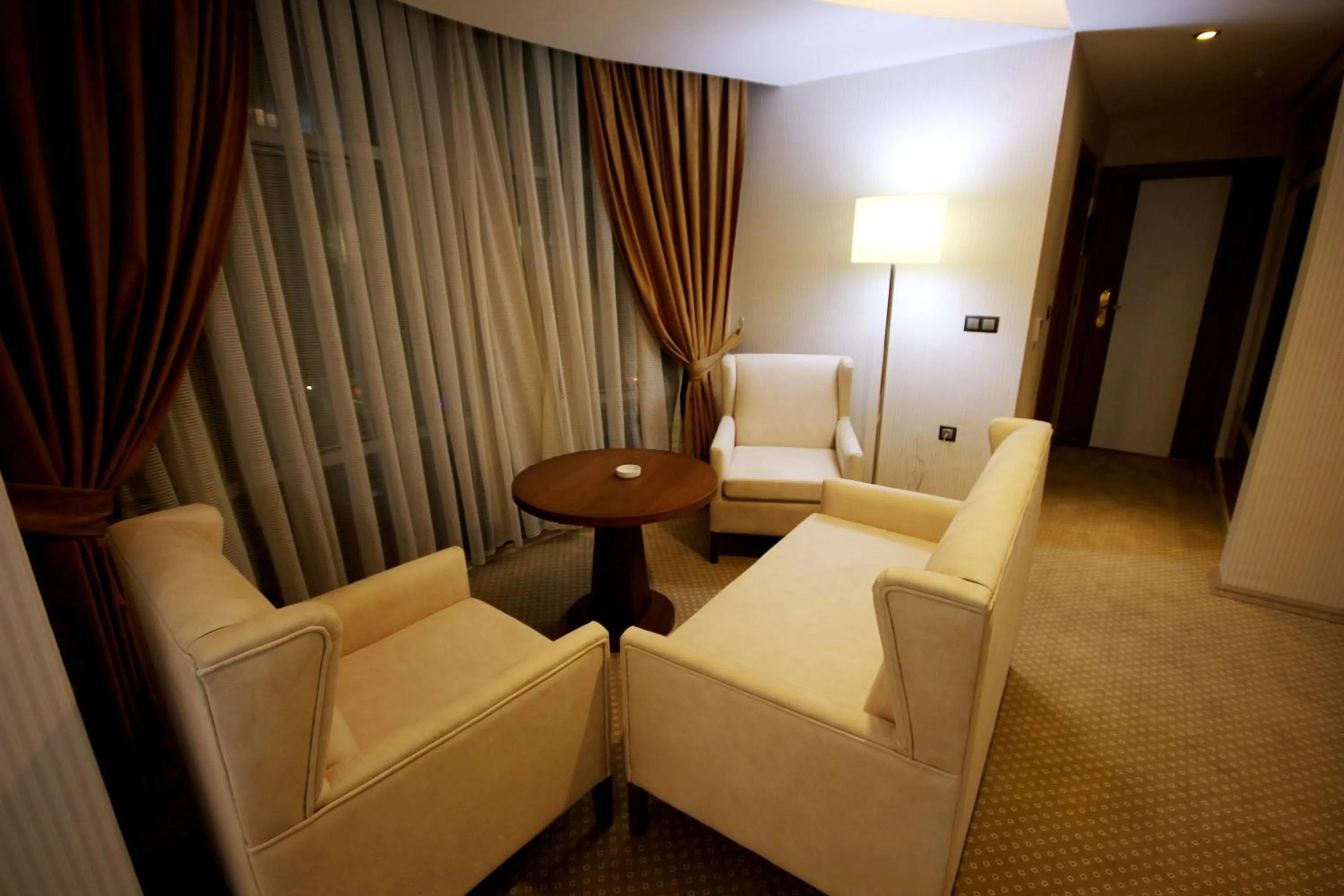 Communal lounge/ TV room in The Ancient Mesopotamia Hotel