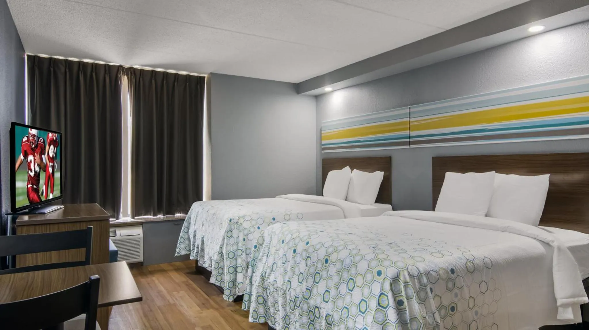 Photo of the whole room, Bed in HomeTowne Studios by Red Roof and Conference Center Chicago - N Aurora Naperville