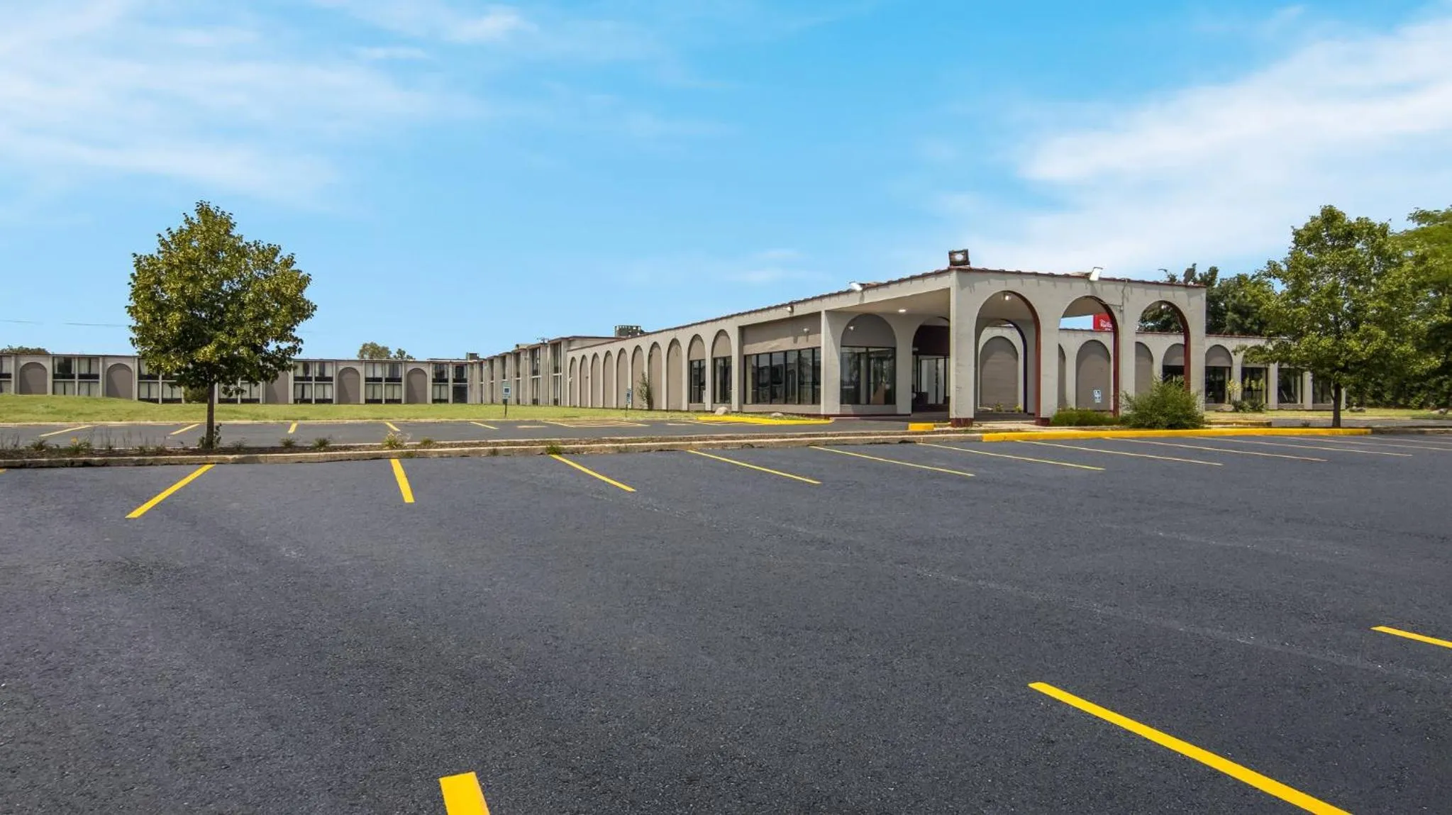 Property building in HomeTowne Studios by Red Roof and Conference Center Chicago - N Aurora Naperville