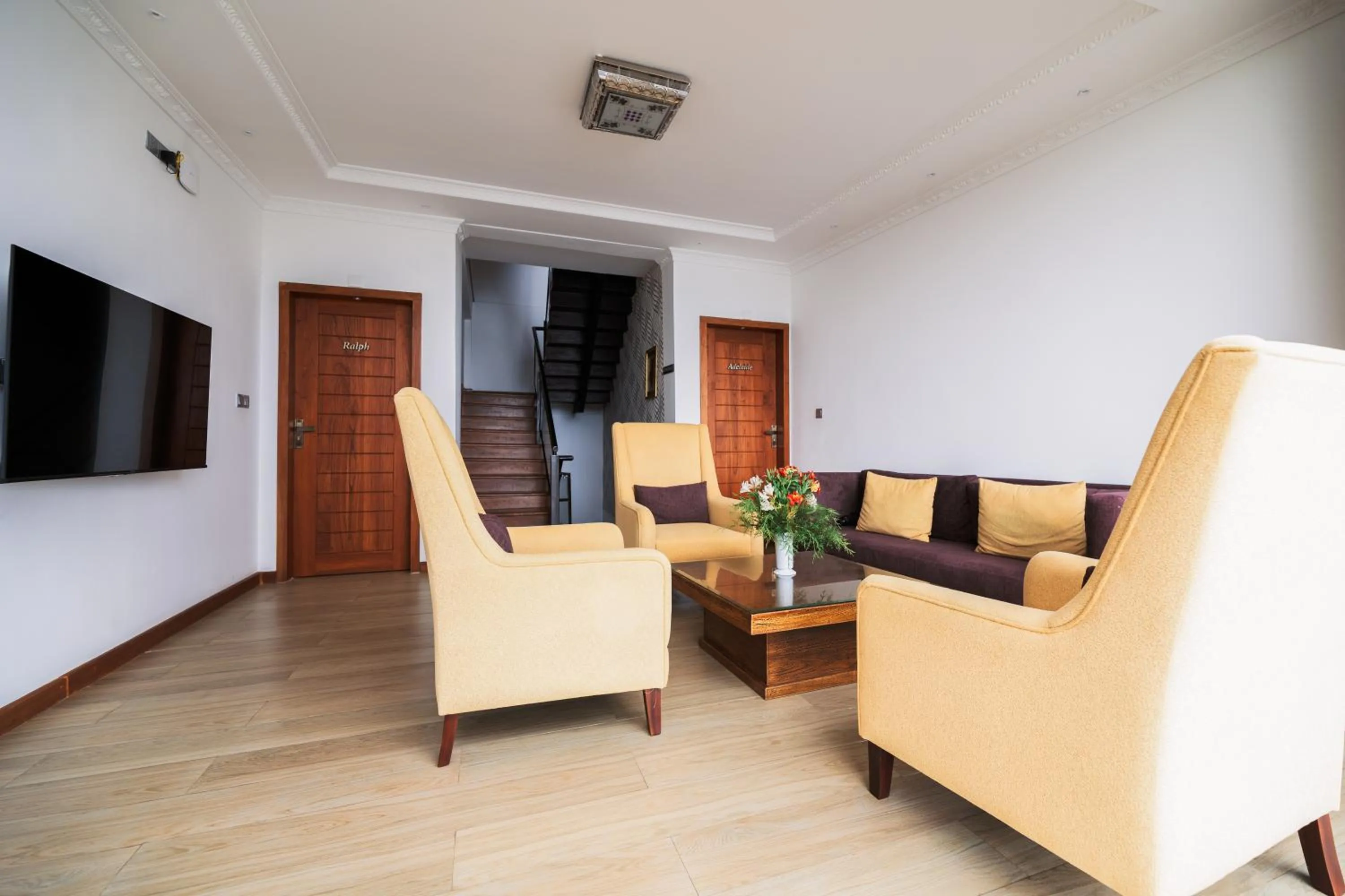 Communal lounge/ TV room in Baron Luxury Boutique