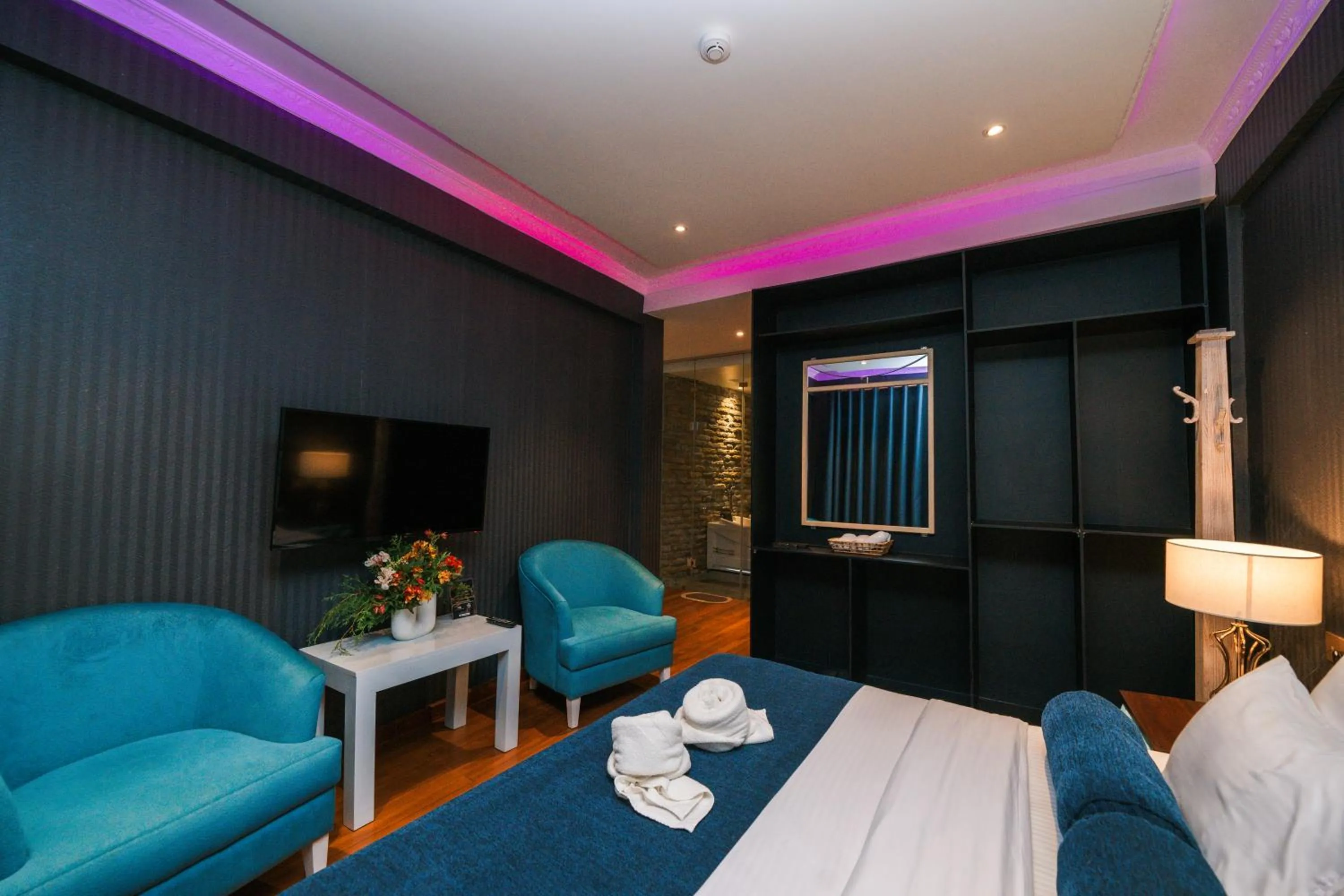 Living room, Bed in Baron Luxury Boutique