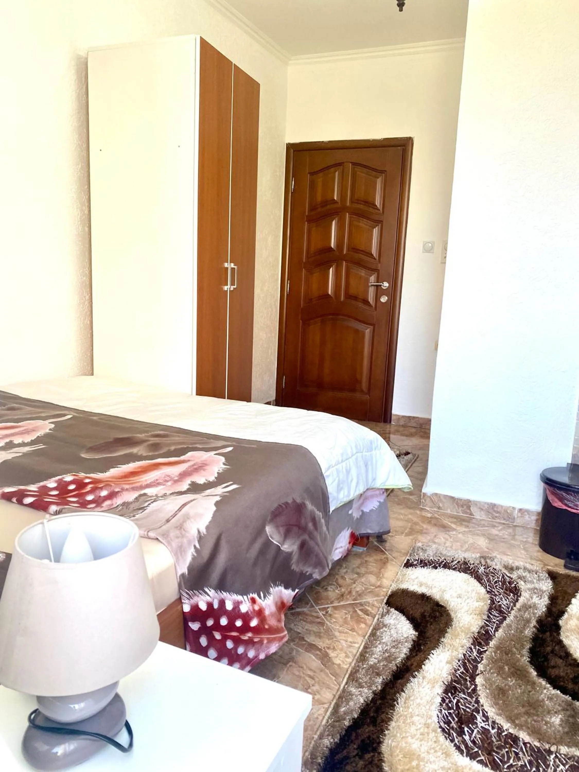 Bed in Apartments Zuto