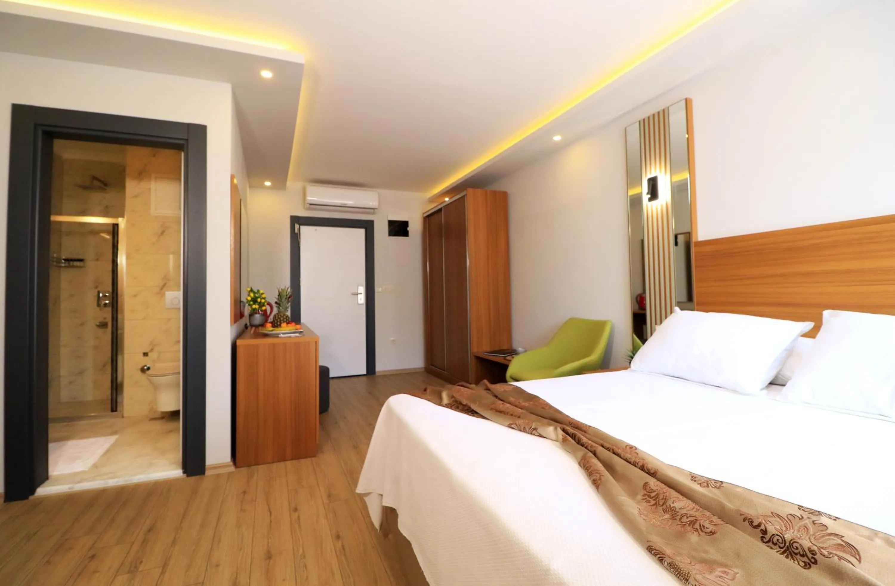 Bed in ALMIRCAN HOTEL