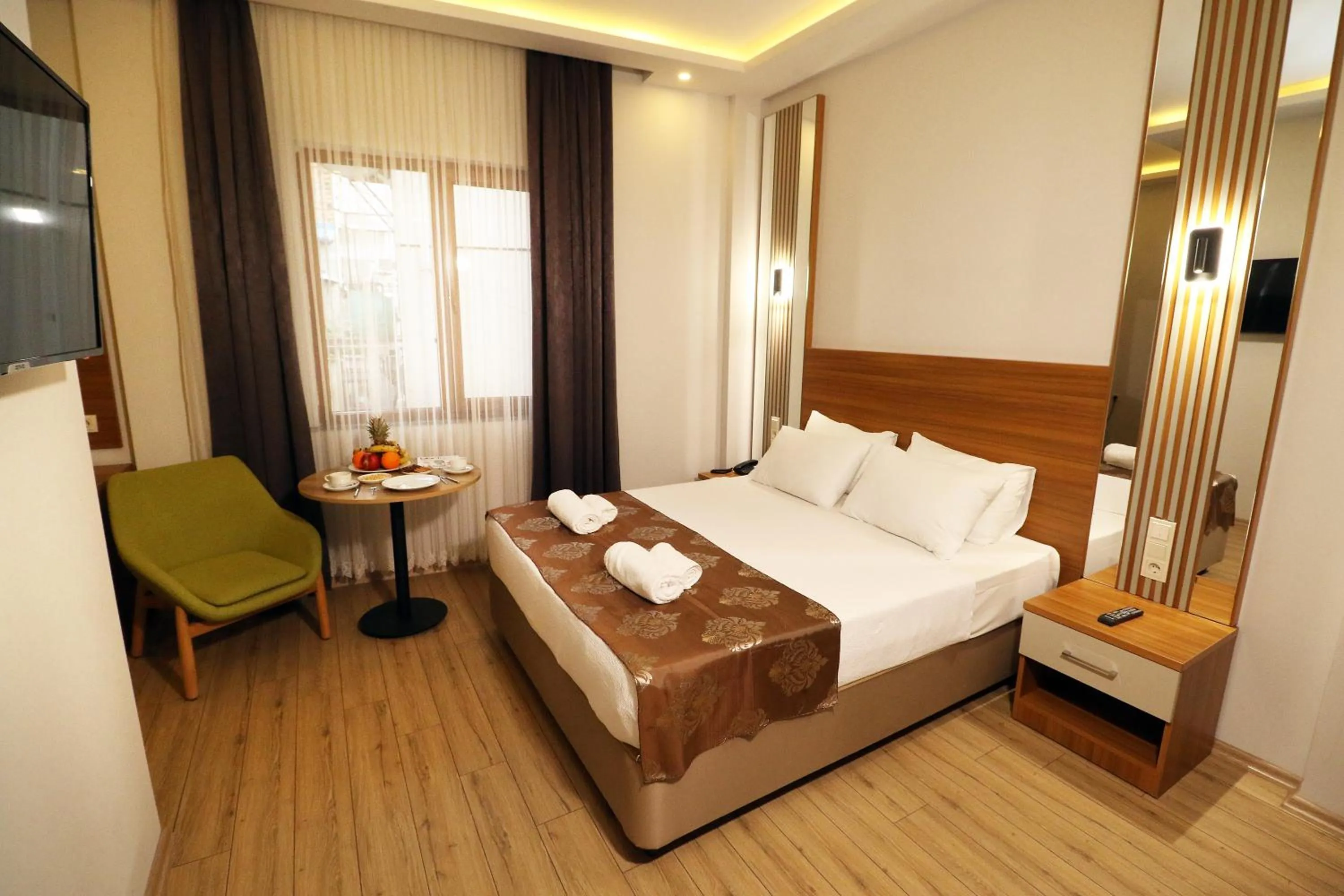 Bedroom in ALMIRCAN HOTEL