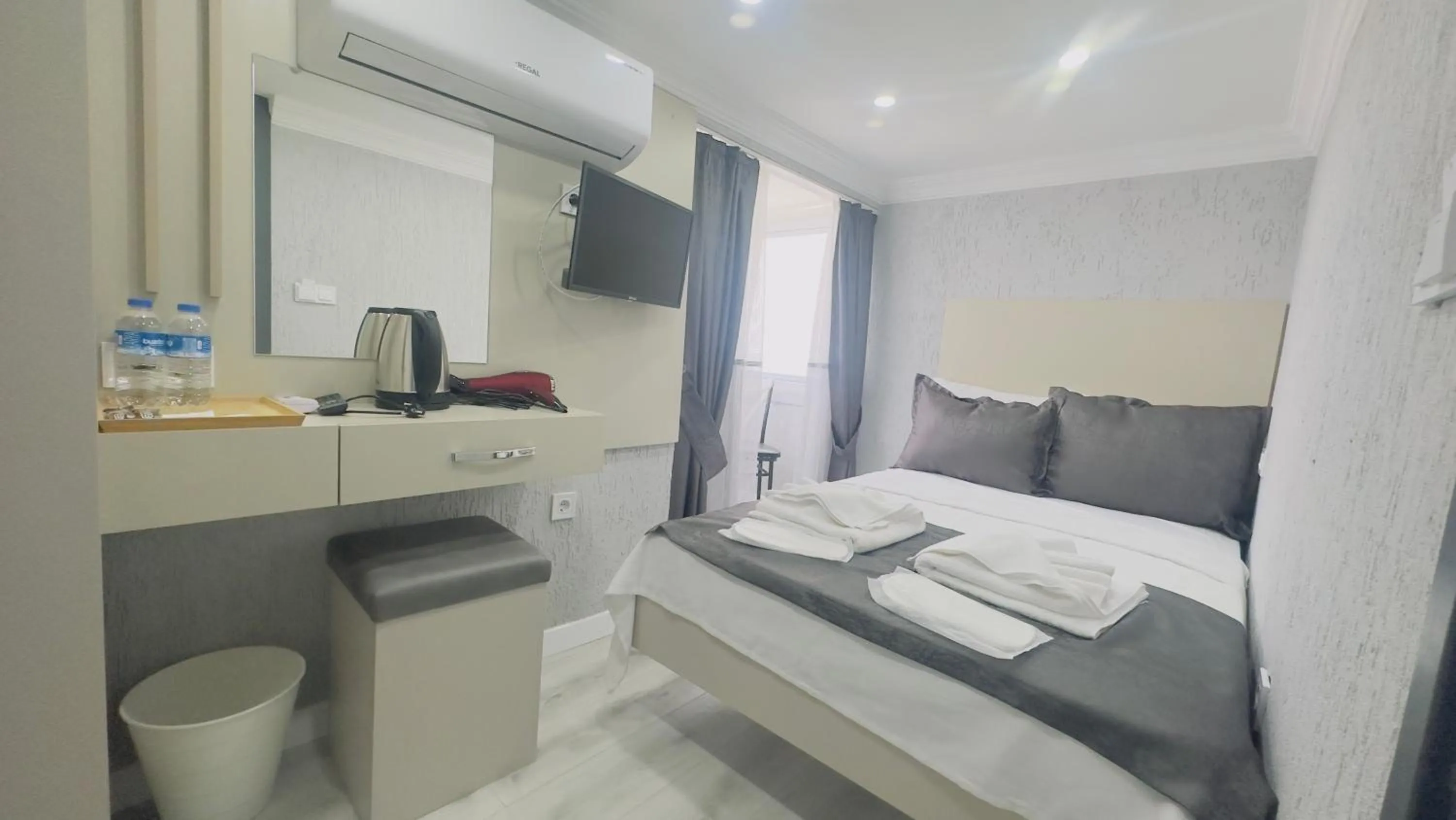 Bed in La Mer Old City Hotel